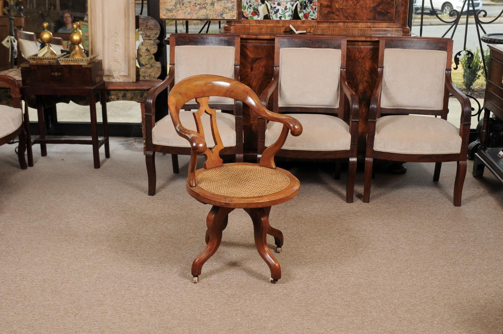 English Victorian Walnut Desk Chair with Swivel Caned Seat, England, Late 19th Century For Sale