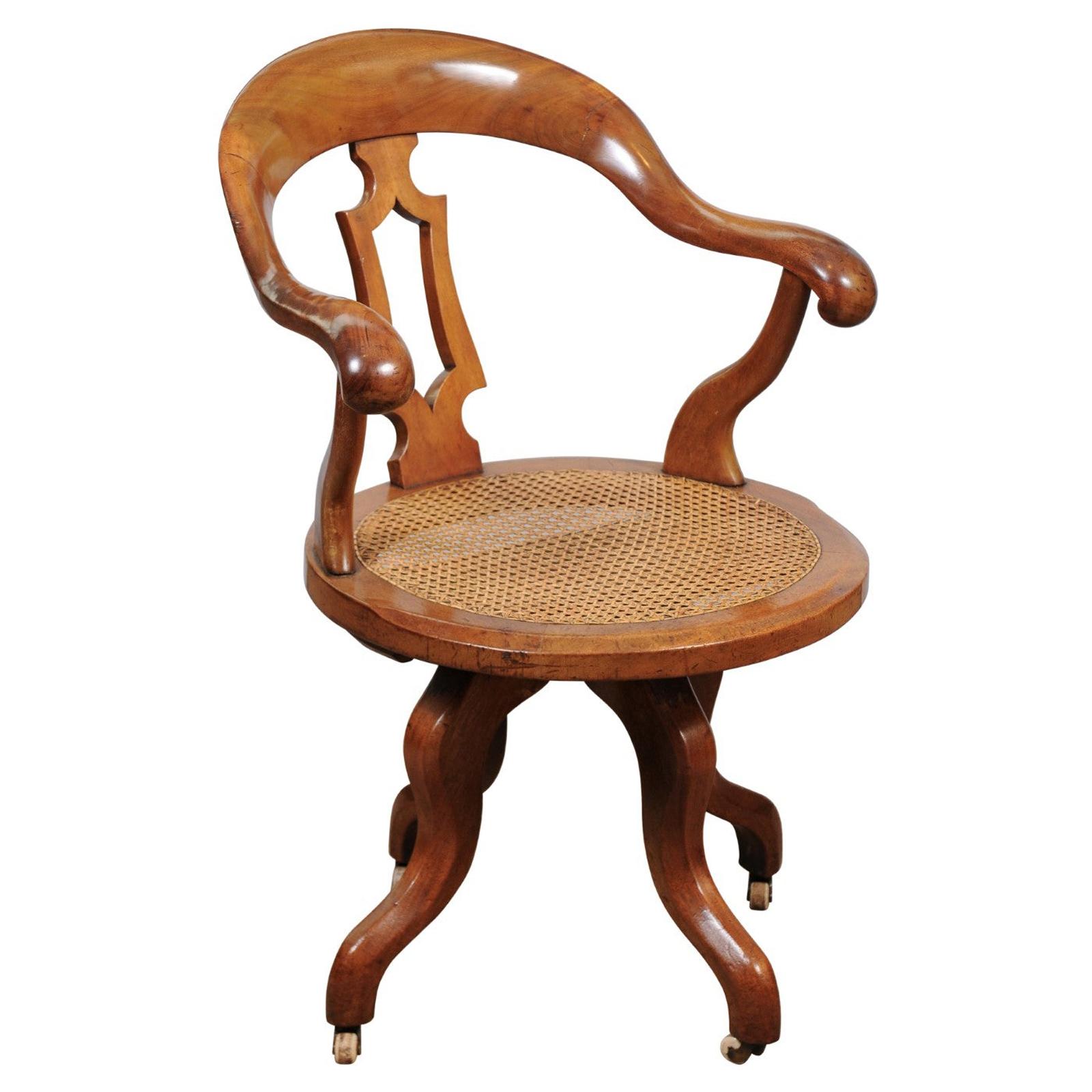Victorian Walnut Desk Chair with Swivel Caned Seat, England, Late 19th Century
