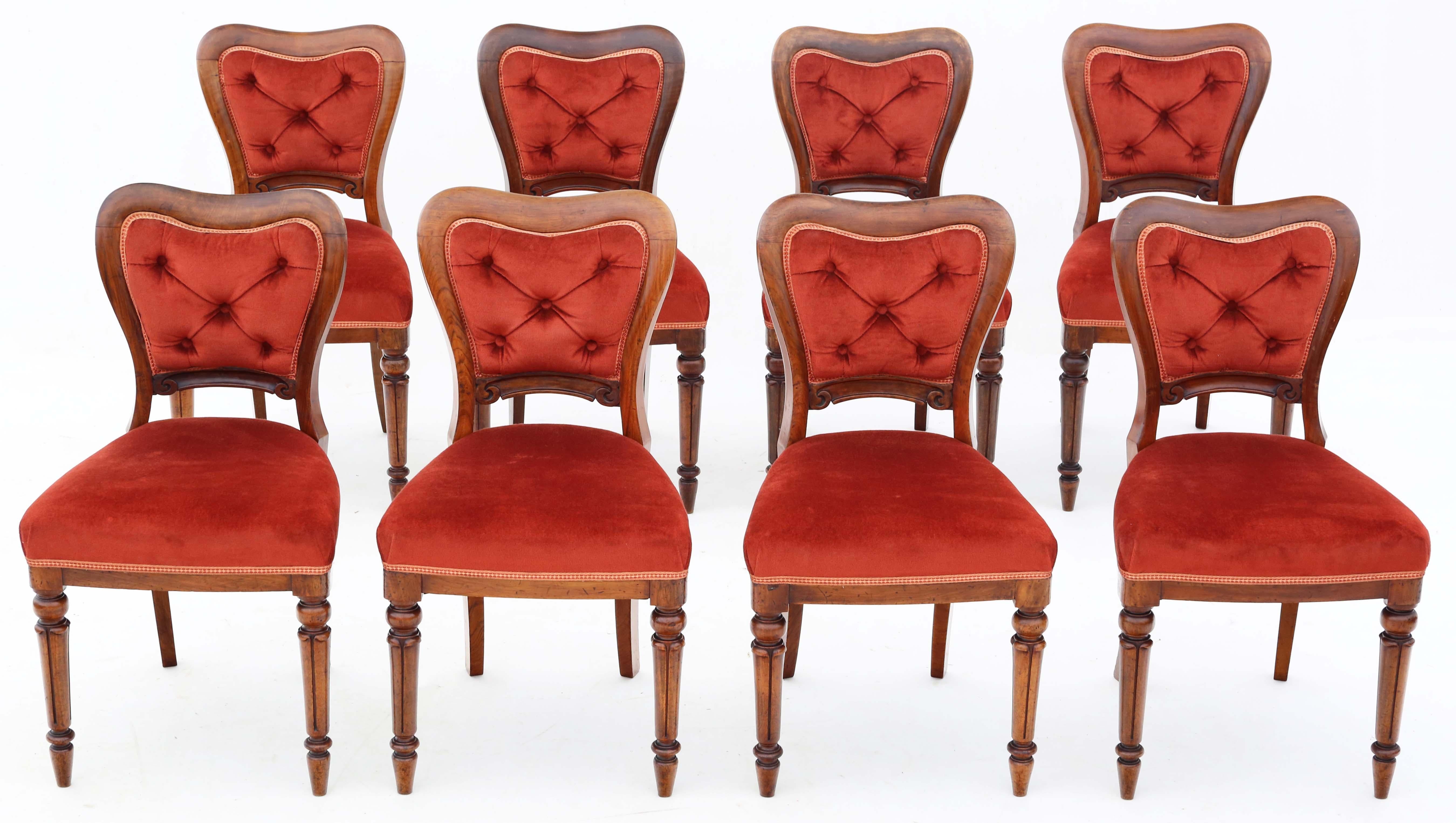 Discover the exquisite craftsmanship of this rare set of 8 Victorian walnut dining chairs from the 19th Century, boasting desirable padded backs for added comfort. These chairs are a testament to timeless elegance, featuring solid construction with