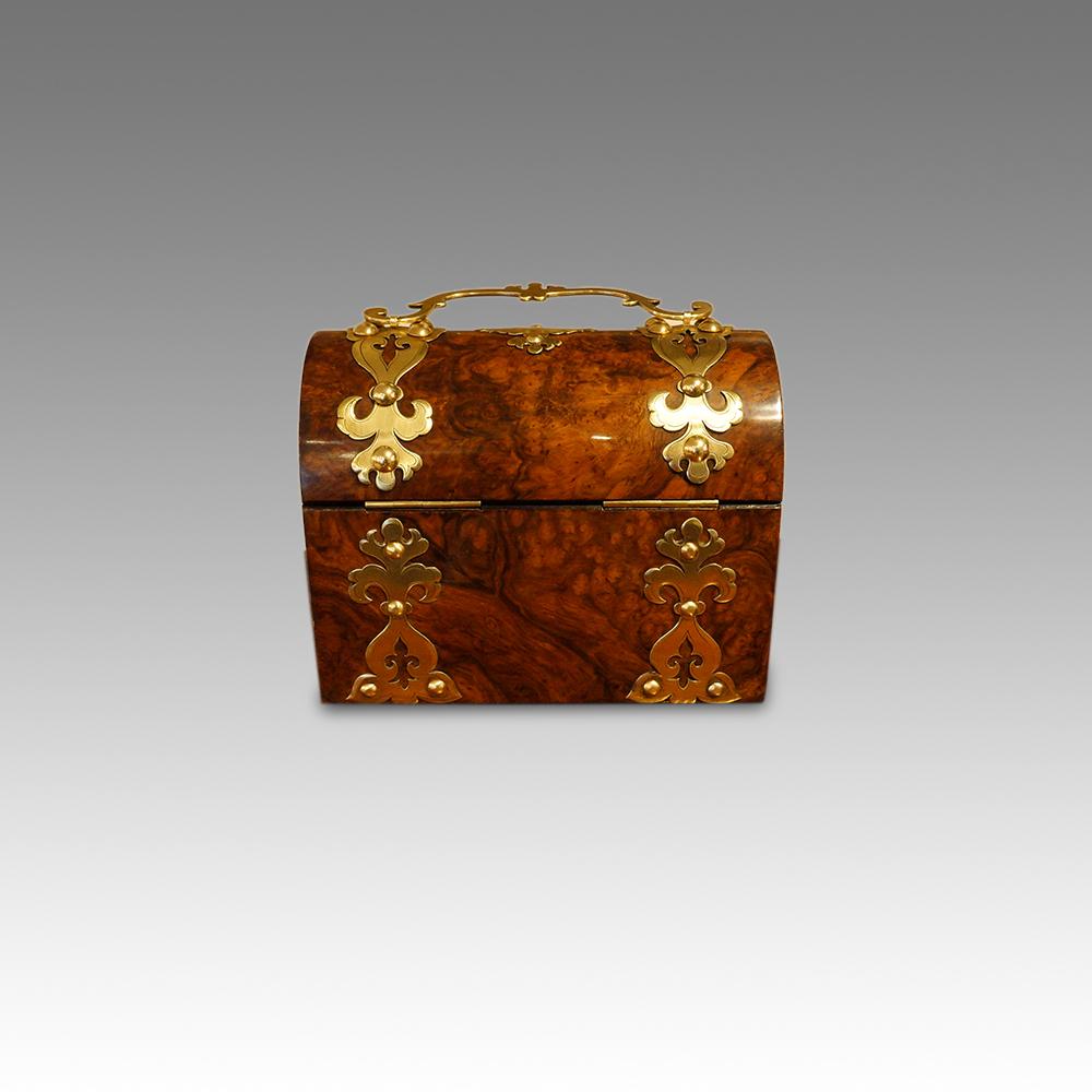 Victorian walnut dome top casket
A Victorian walnut dome top casket, that was made, circa 1870.
This very attractive box has fine applied brass strapwork and the original shaped swing handle.
We have lined the interior so that it ready to make as