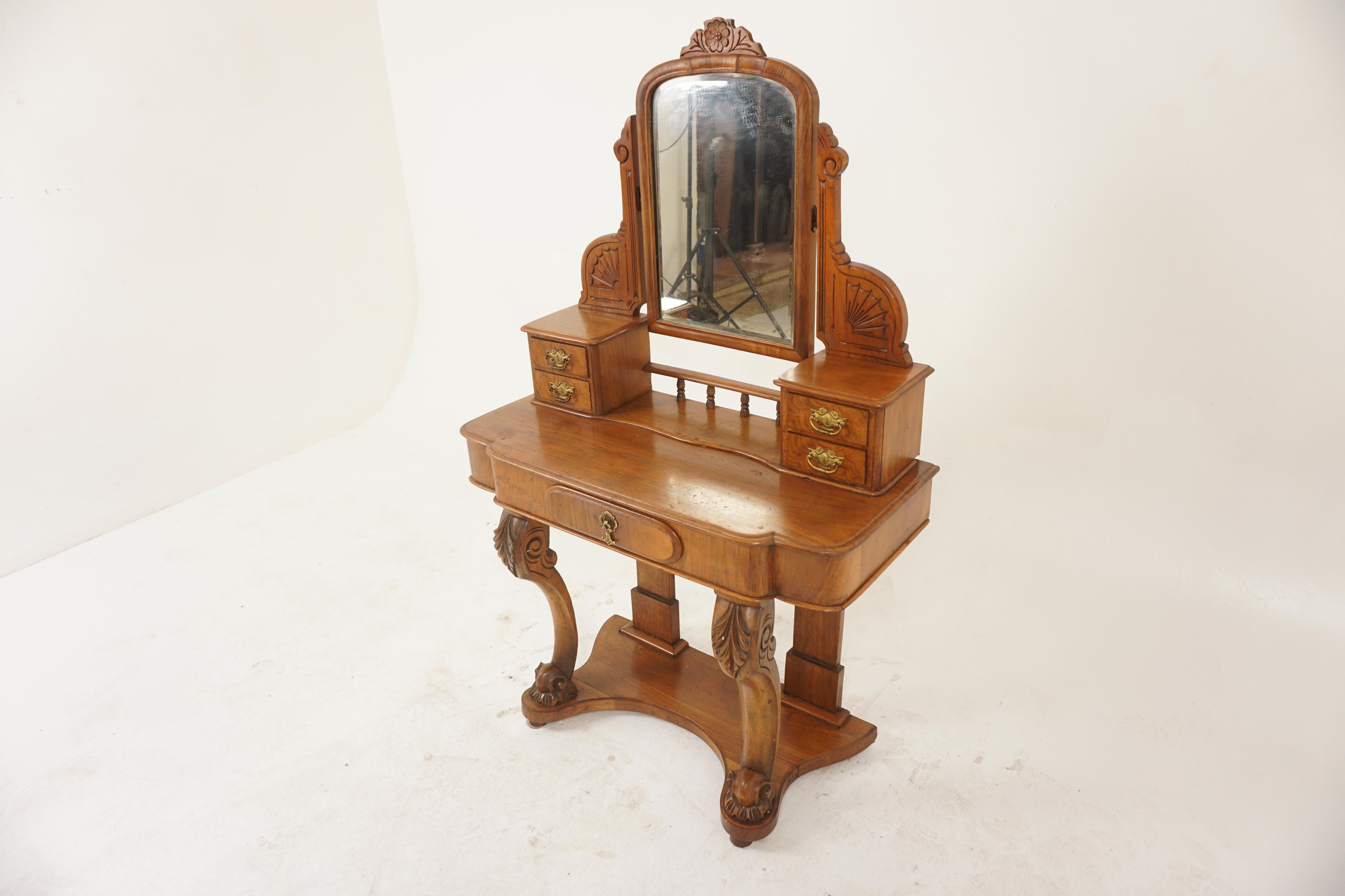 Victorian Walnut Duchess Dressing Table, Vanity, Scotland 1870, H1160

Solid Walnut and veneer
Original finish
Original framed mirror with pediment on top
Supported by carved supports
Open gallery on the back
Flanked by a pair of drawer chests with