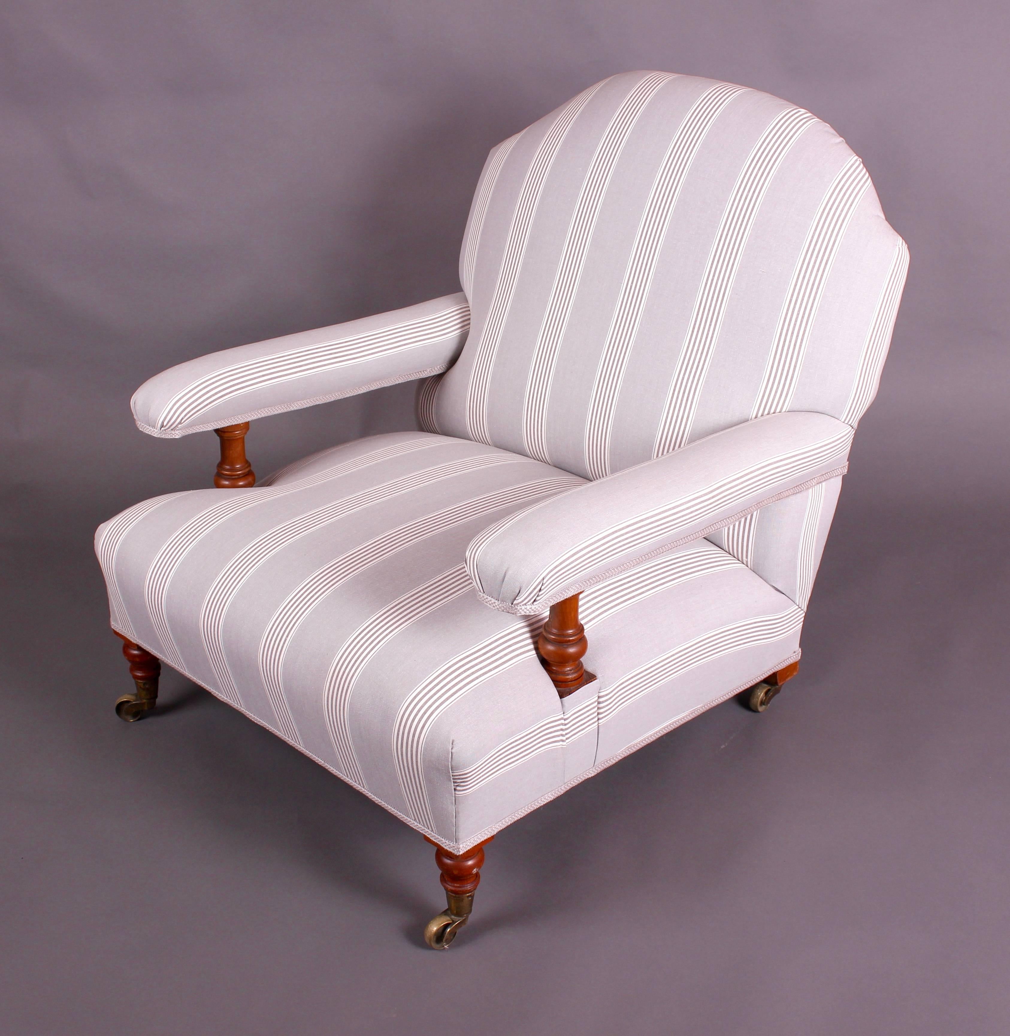 A lovely fully restored easy armchair by the famous maker Howard & Sons. We have used an almost identical fabric which was originally on the chair. The chair has been strengthened and stands strong and sturdy. Upholstered by our Sussex based