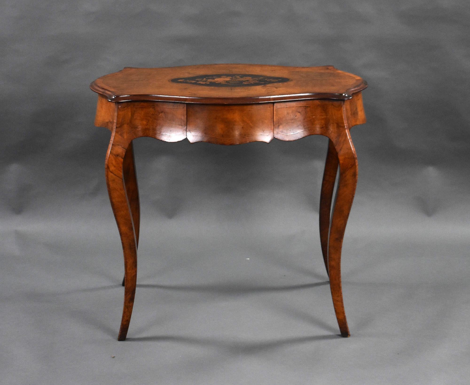 For sale is a good quality Victorian walnut marquetry centre table, serpentine in form, having an inlaid top above a central drawer, standing on elegant legs, this piece is in very good condition.

Width: 81cm Depth: 55cm Height: 72cm