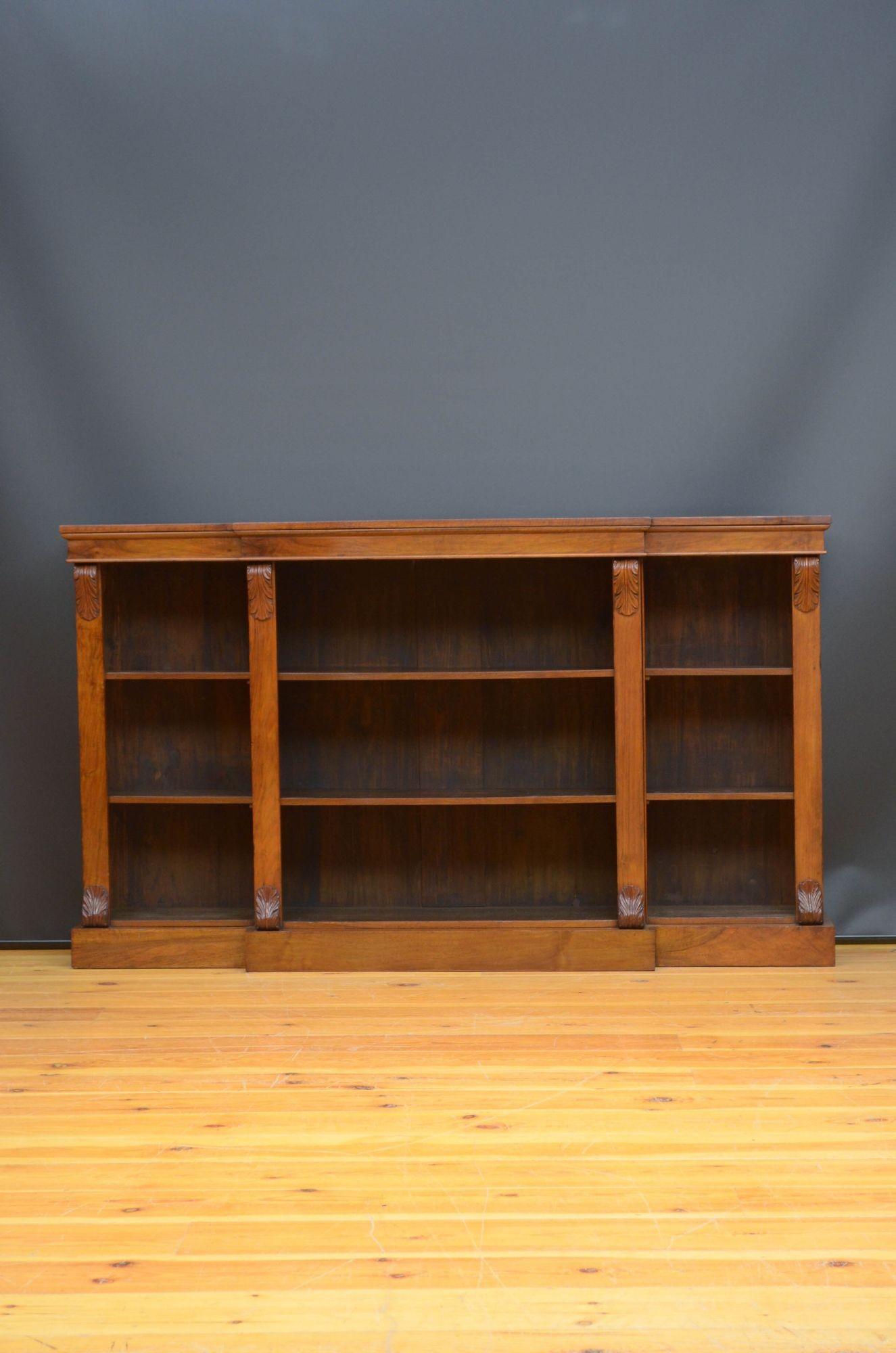Sn5375 Victorian figured walnut open bookcase of break fronted design, having attractive figured walnut top above a shallow frieze and projecting centre section, flanked by further open sections each with height adjustable shelves and flanked by