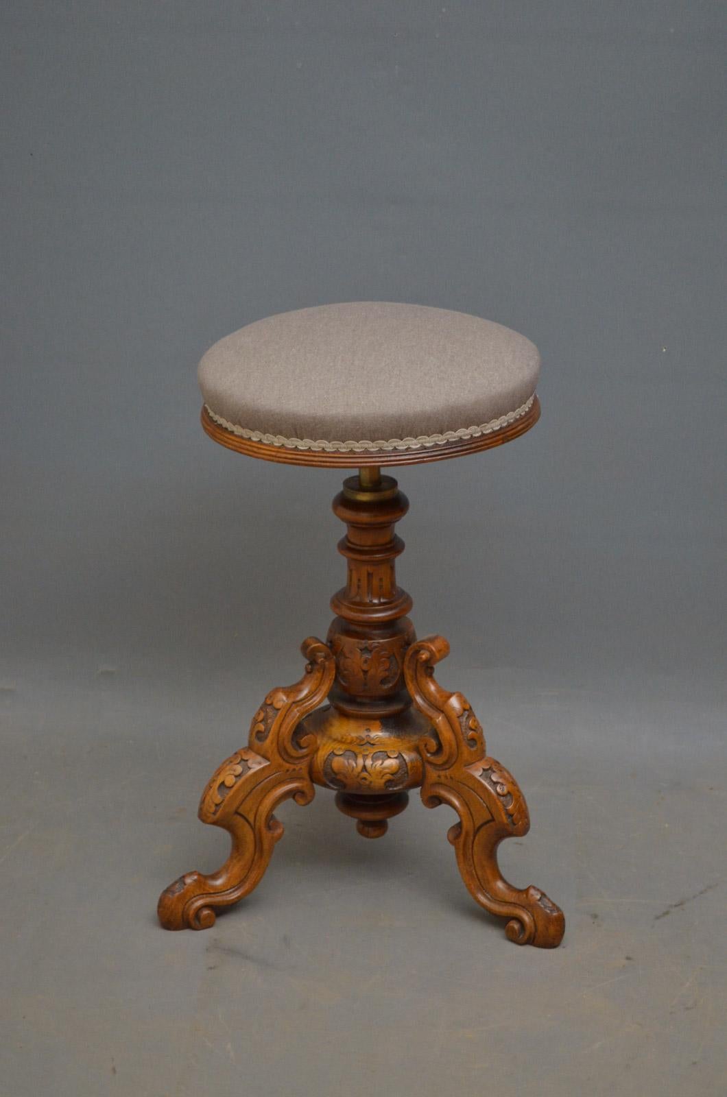 Sn4388, Victorian dressing table stool in walnut, having height adjustable seat and finely carved column terminating in three cabriole legs, circa 1870.
Measures: Height 21-24