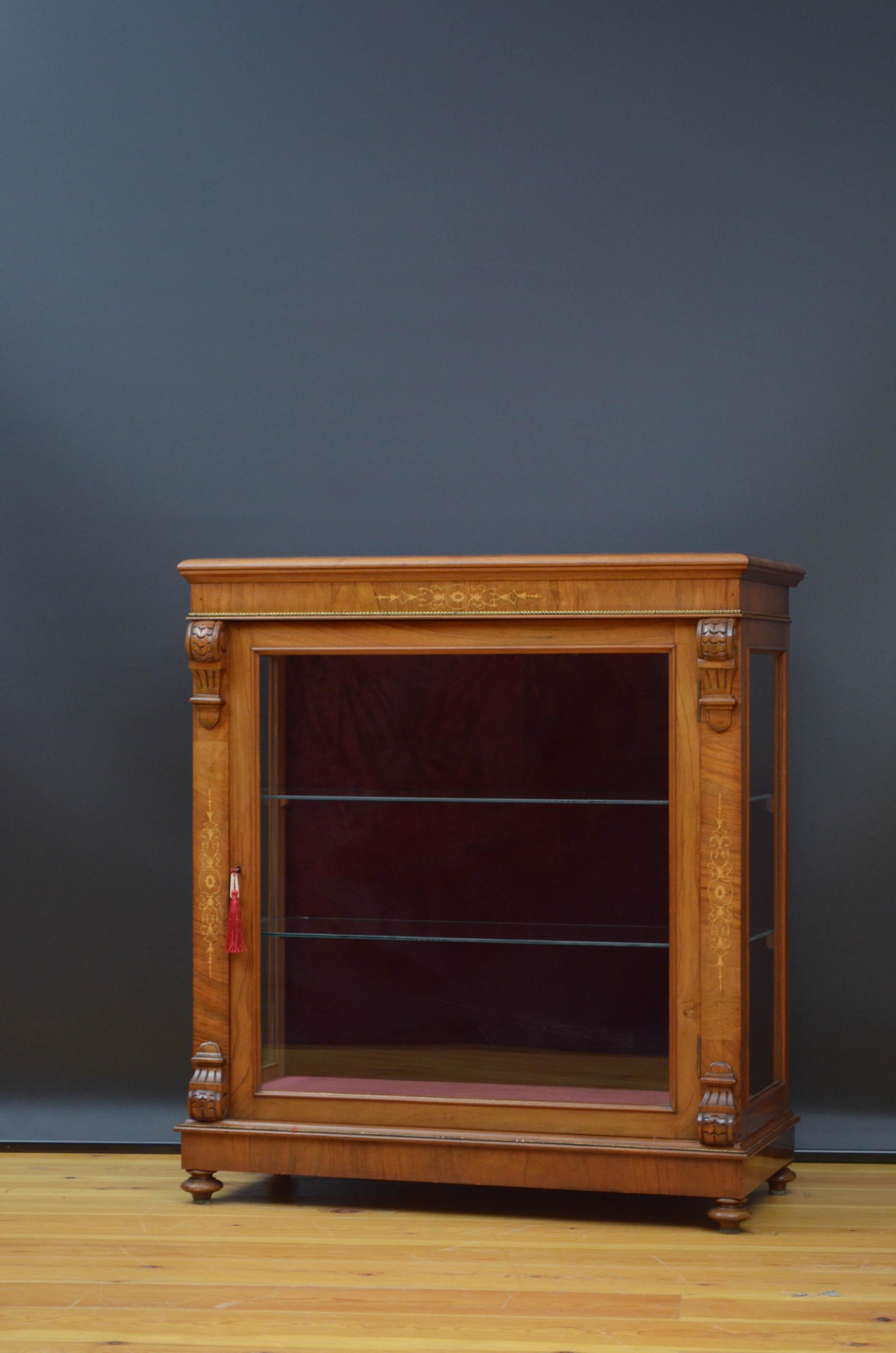 Sn5115 Very attractive, Victorina walnut display cabinet, having outstanding burr walnut top with moulded edge above string inlaid frieze and a glazed door fitted with original working lock and enclosing relined interior and two glass shelves ,all