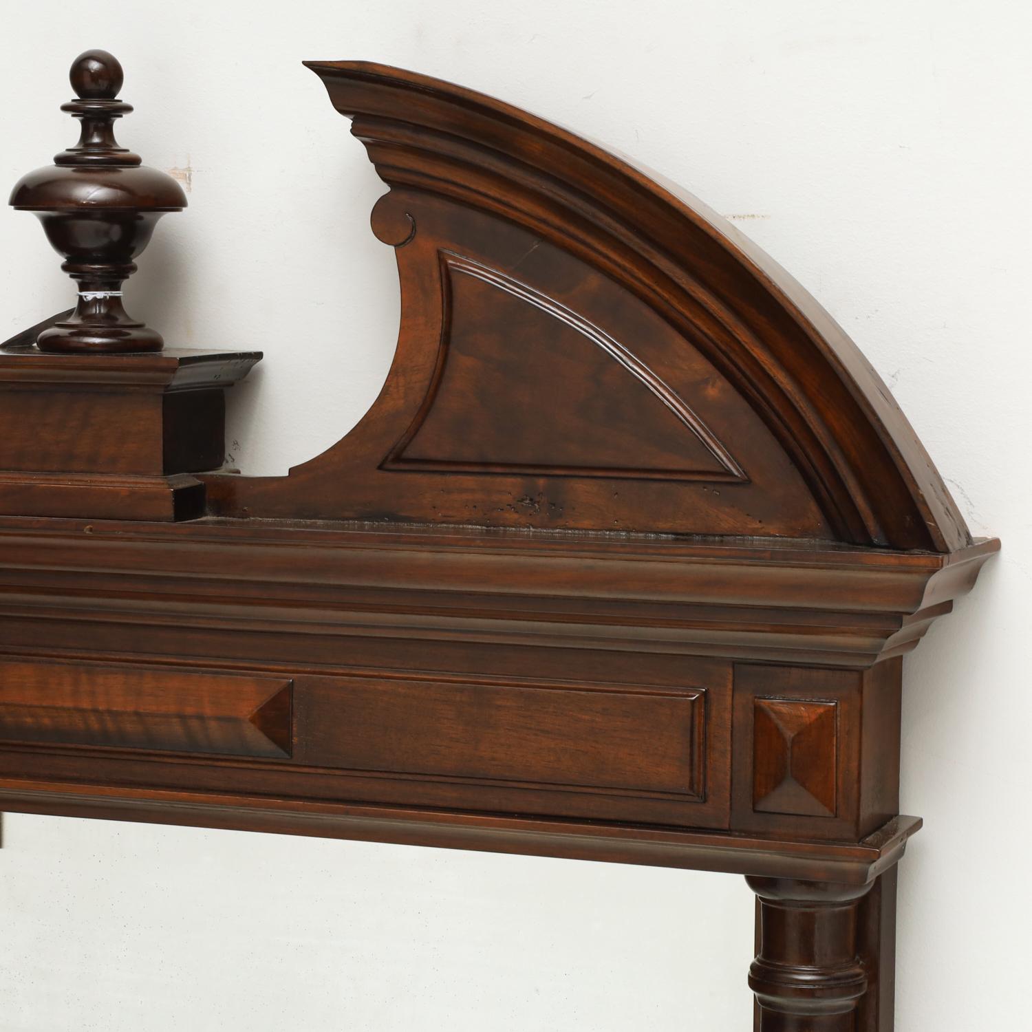 19th/20th C., large handsome Victorian walnut pier mirror. Open pediment top with central spire, carved baluster frame, beveled glass, no visible marks

Dimensions:
62