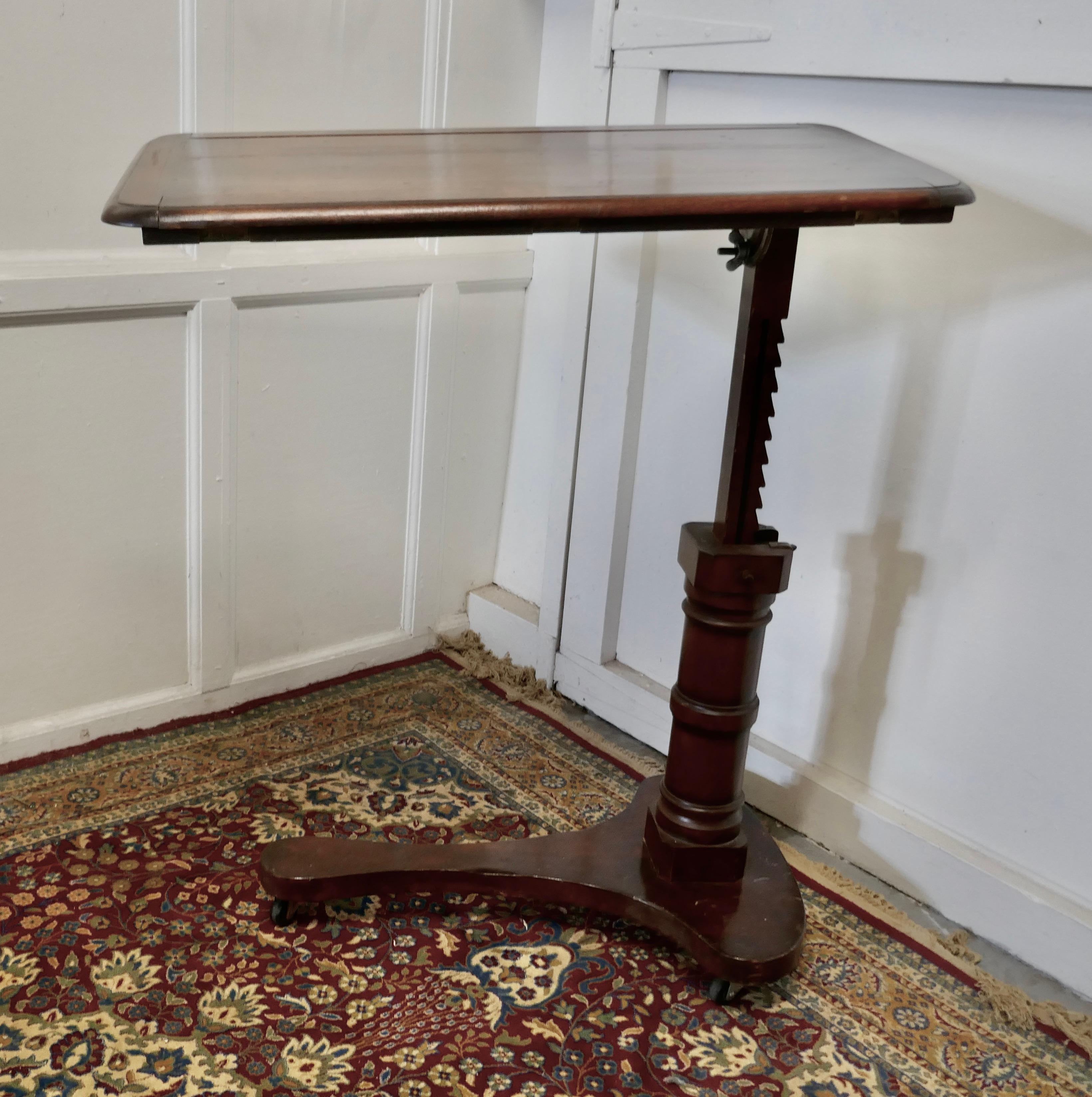 Victorian walnut, reading stand over bed table, 

This is a very versatile piece, the table has an easily adjustable height, so will sit over a bed or a chair and this tilts too if required, at both sides there are concealed book rests so that the