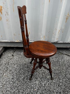 Victorian Walnut Spindle Back Ball And Claw Swivel Piano Stool