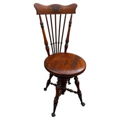 Victorian Walnut Spindle Back Ball And Claw Swivel Piano Stool