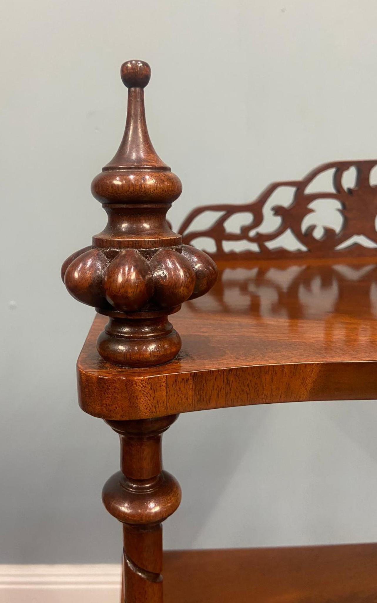 You are viewing an elegant Victorian whatnot in walnut
Circa 1880
Material - Made from richly polished mahogany with a warm, deep patina
Design - Three graduated tiers/shelves supported by elaborately spiral-turned columns with ornamental baluster