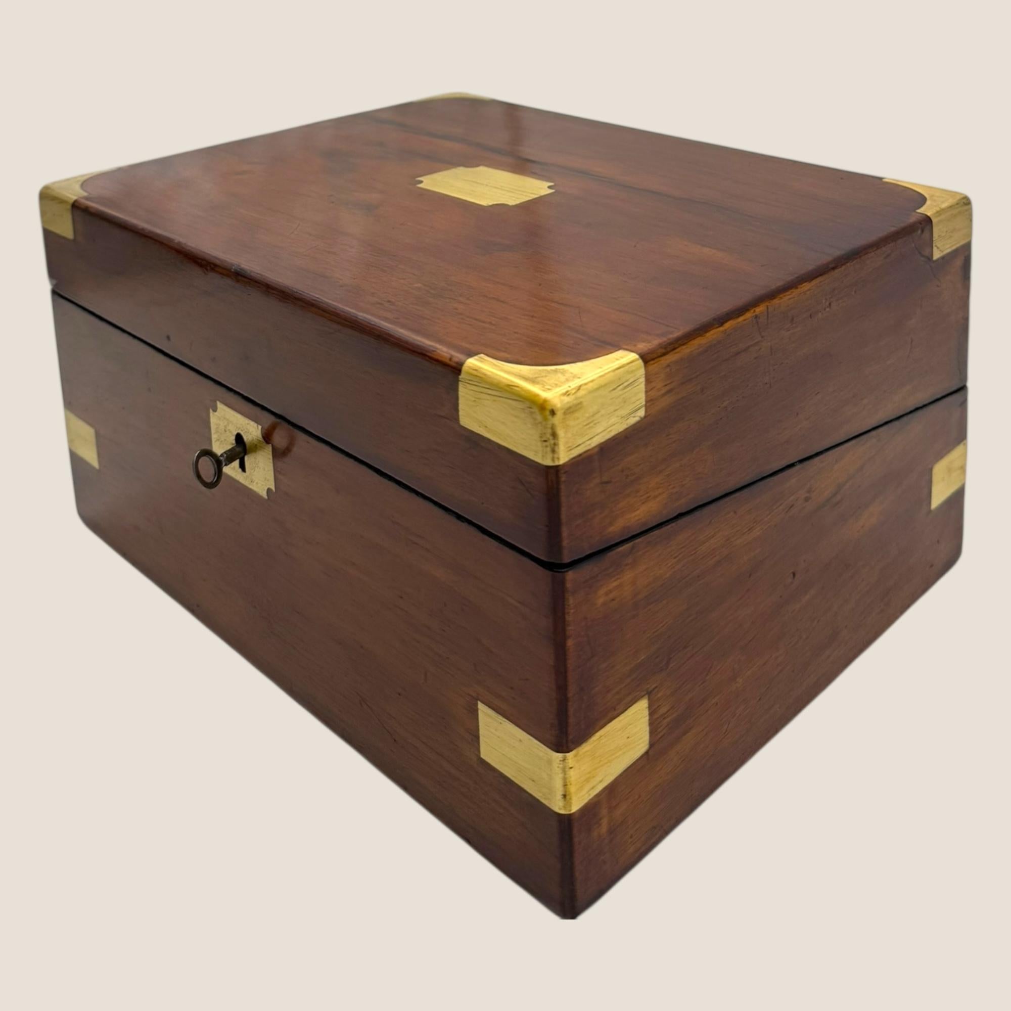 Here we have a Victorian (1837-1901) Walnut & Brass Writing Box. This opens to form writing slope set with black leather with a gold patterned embossing detail surround. Both the top section of the leather and the bottom open to reveal sectioned