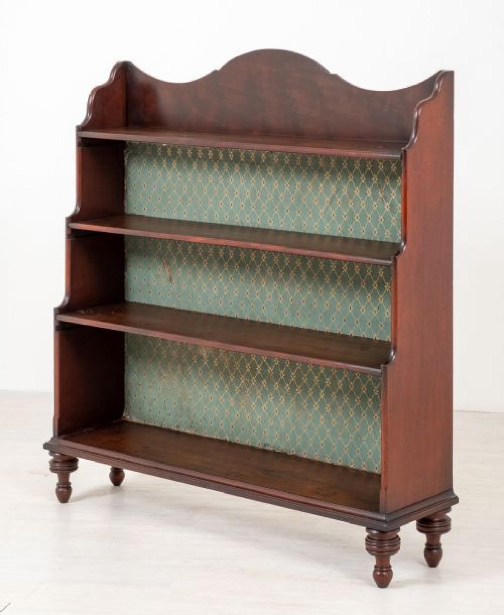 Mahogany Waterfall open Bookcase.
This Waterfall Bookcase is of a Typical Form.
Circa 1850
Featuring Ring Turned Feet, 3 Graduated Shelves and a Shaped Top.