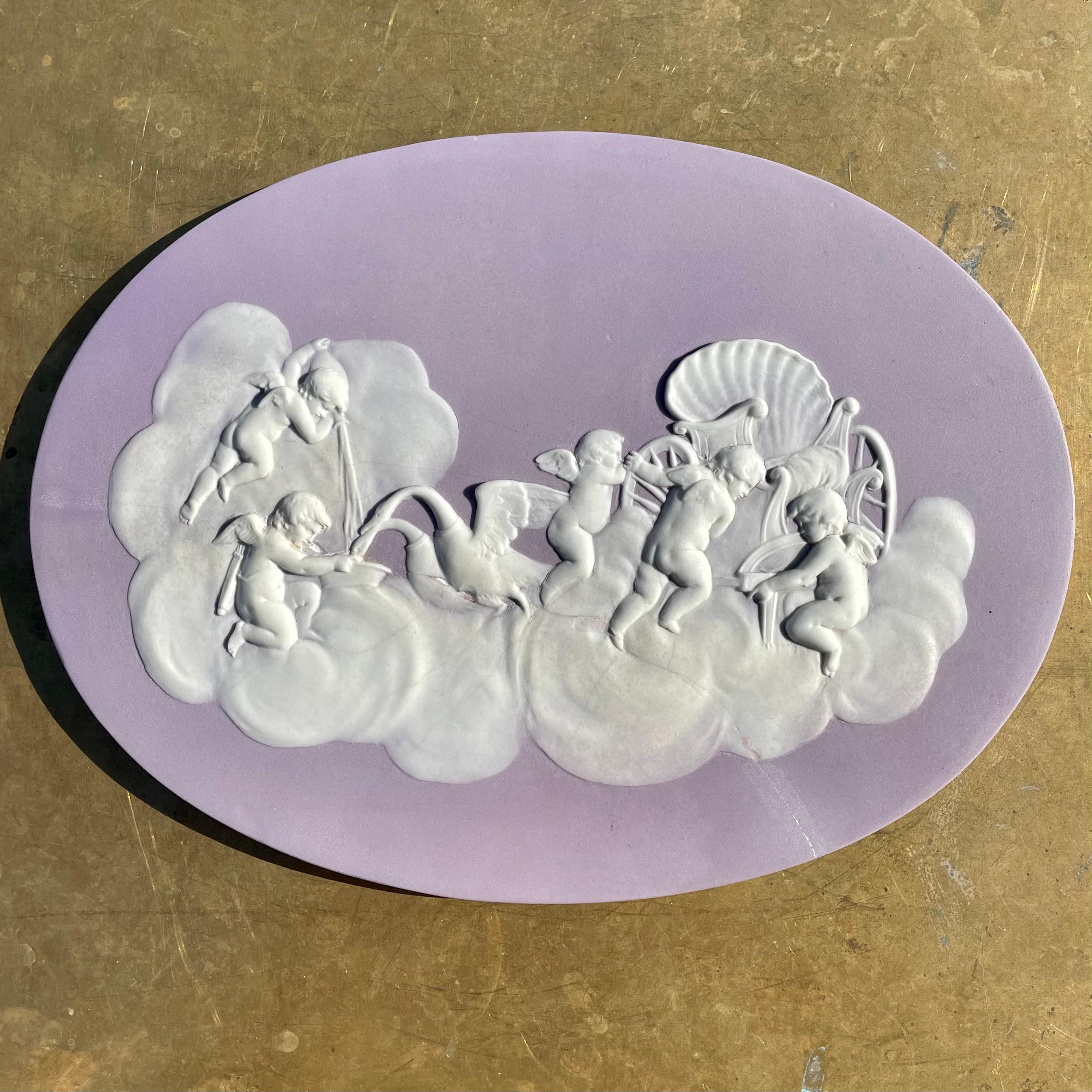 Etruria, Staffordshire, mid-to-late 19th century, white stoneware with lilac jasper dip ground, sprigged white jasper bas-relief decoration depicting Cupids Watering the Swans, impressed 