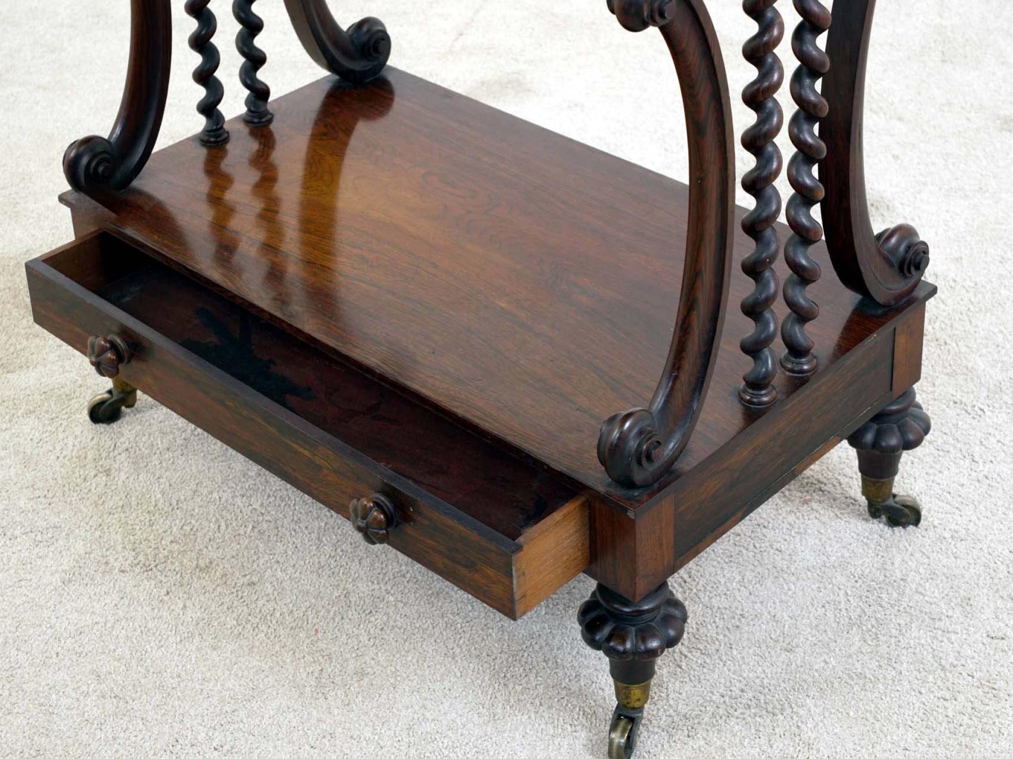 You are viewing a stunning period Victorian whatnot or bookshelf Circa 1880 and hand crafted from mahogany
Three-tier form with flat display shelves, ideal for books,
ornaments, or curios
Elegant barley twist (spiral turned) columns flanking each