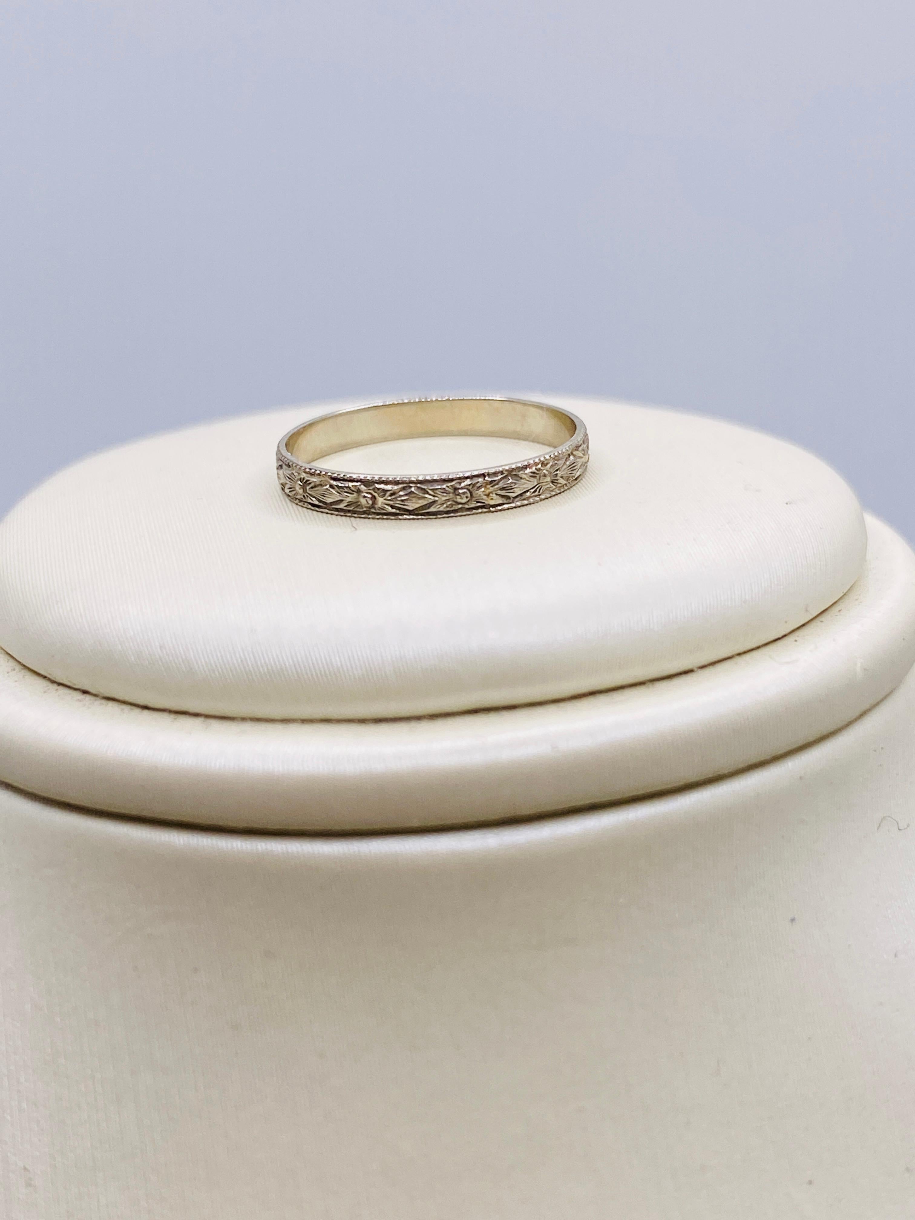 Victorian 10k White Gold Baby Band Ring. 0.2Dwt. Size 0 ***PLEASE NOTE: this ring is size US 0 (zero) or smaller. Please refer to photo along side a dime for reference.