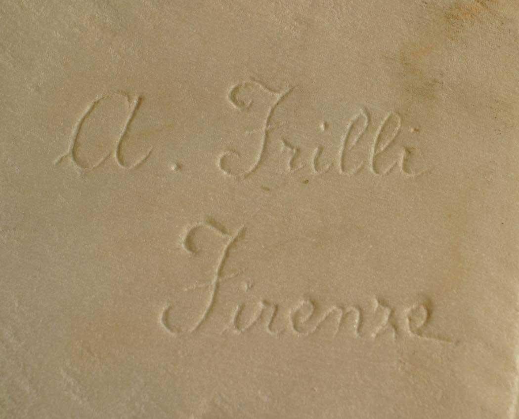 Busto victoriano americano de mármol blanco de caballero con bigote apoyado en una base de pedestal cuadrada (firmado: A. Frille Firemre) (dama a juego - Inv. #060080)

La base mide 9,5 m a 9,5 d.