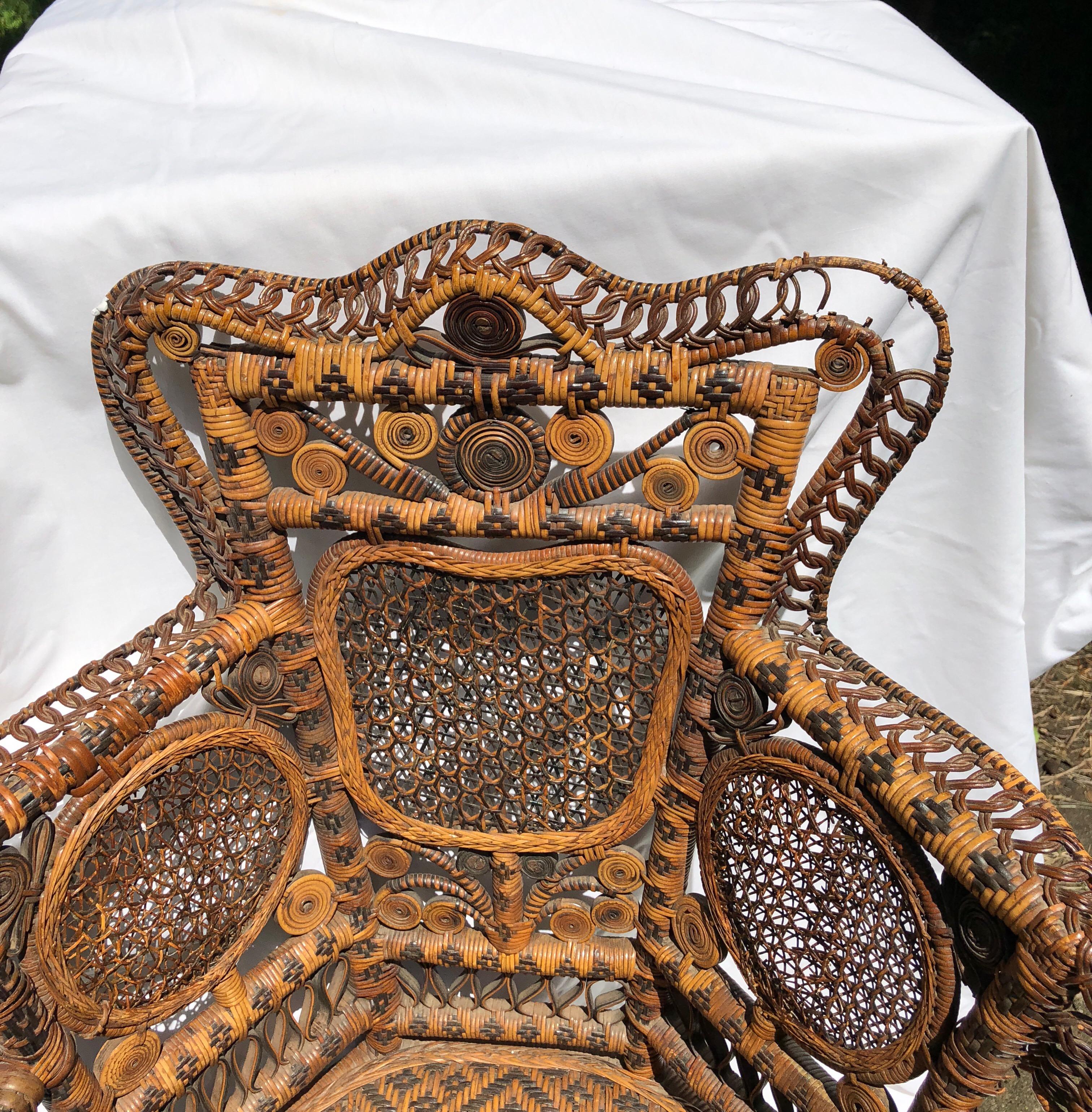 Victorian intricately woven rattan and caned child's chair. Some missing part on right hand of chair's arm.
Has had some restoration and all work secured. Charming little chair.