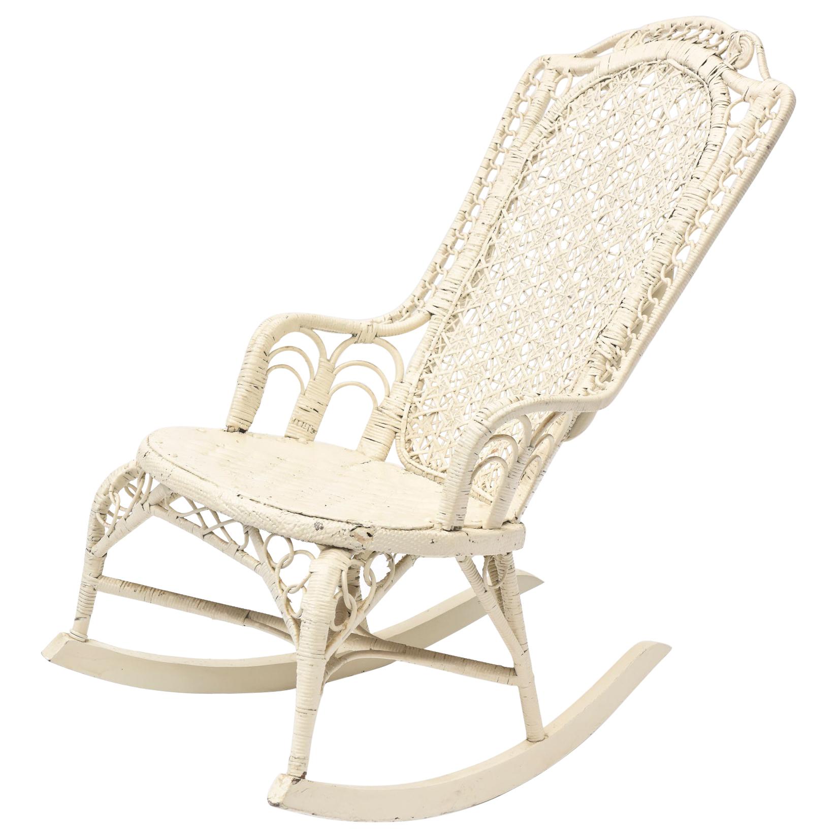 Victorian Wicker Rocker with Interlocking Circle Arms and Spider Woven Back