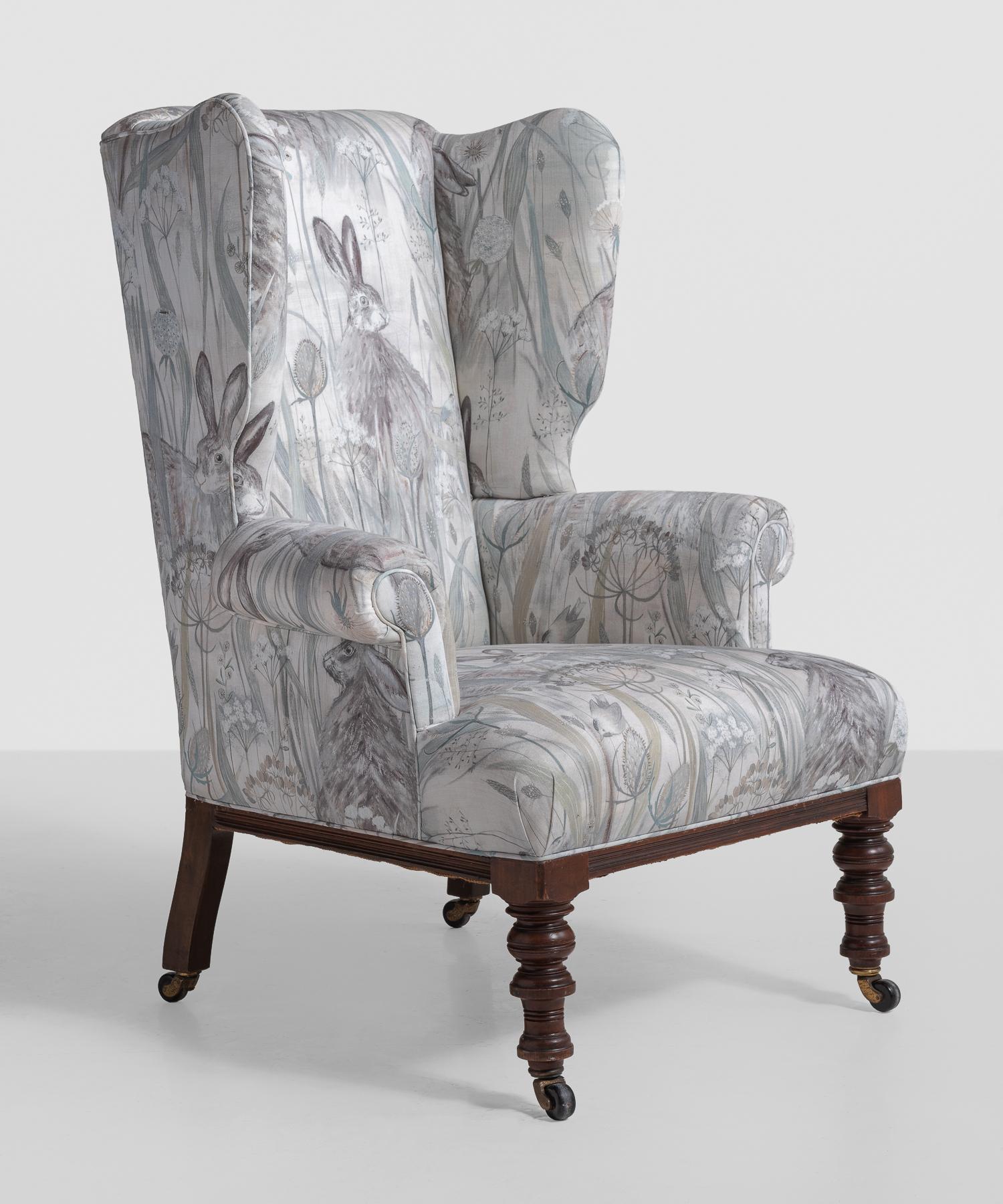 Victorian wingback chair, England, circa 1840.

Newly upholstered in Dune Hares fabric by Sanderson. Turned mahogany legs.

Measures: 28