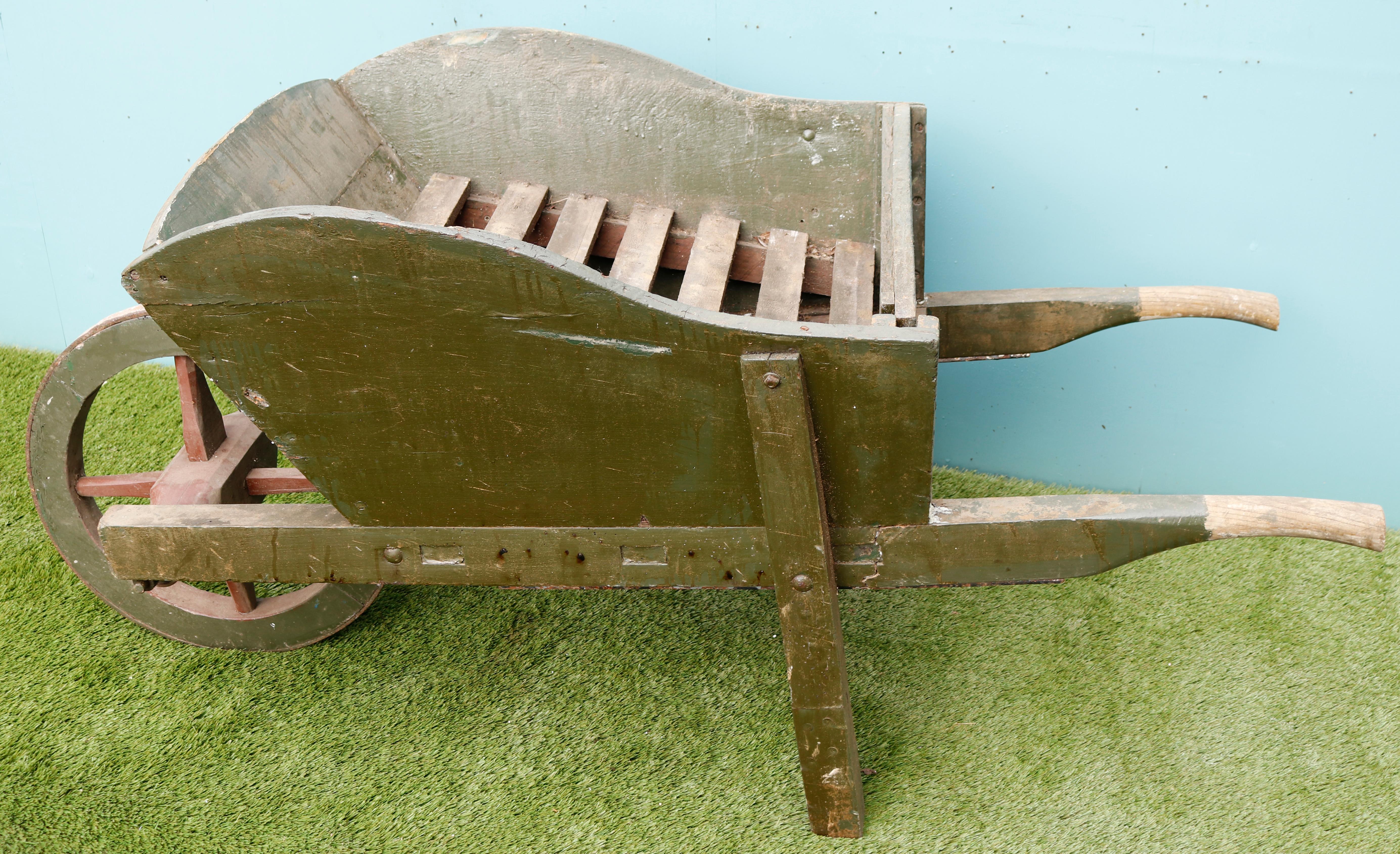 antique wood wheelbarrow