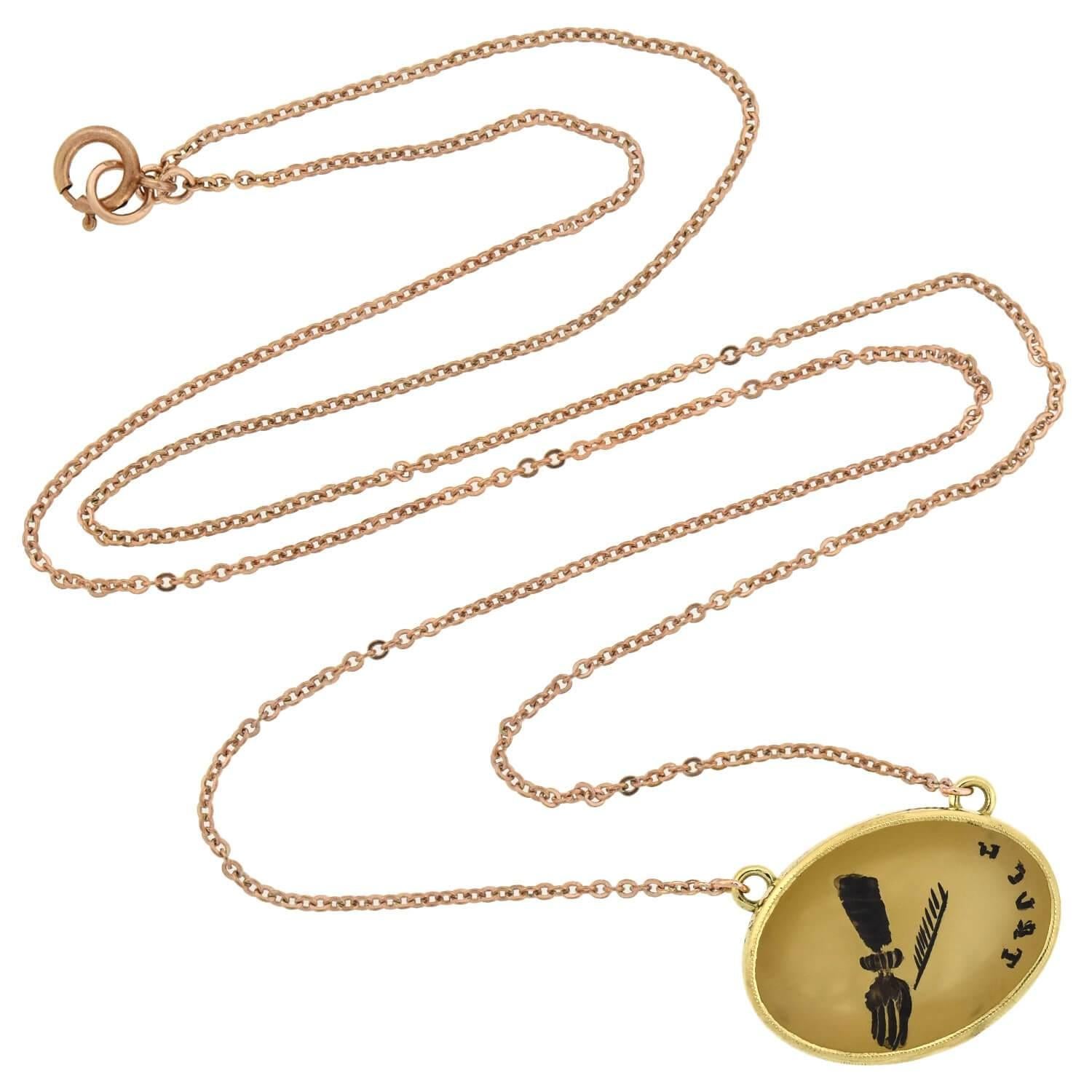 This fabulous necklace is a stylish compilation piece featuring a wonderful Victorian era (ca1880s) carved intaglio! Crafted with 14kt yellow and rose gold, the piece is comprised of a sentimental Victorian era carved intaglio which hangs from a