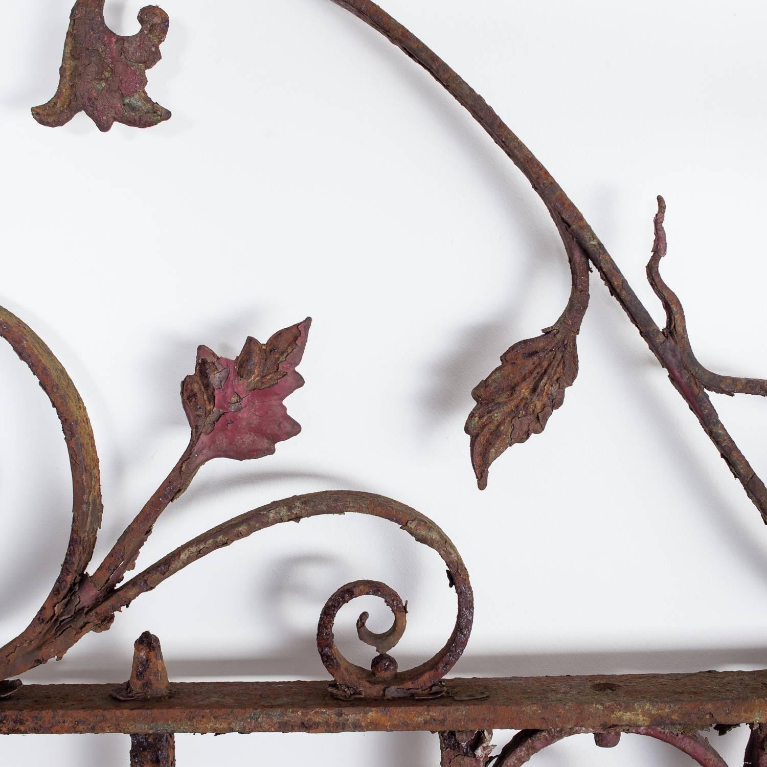 A pair of substantial Victorian wrought iron gates by the foundry J. Haigh, Maker. Leeds. 

Measurements: 192cm height x 252cm width. Right gate approx. 125cm, left gate approx. 128cm.