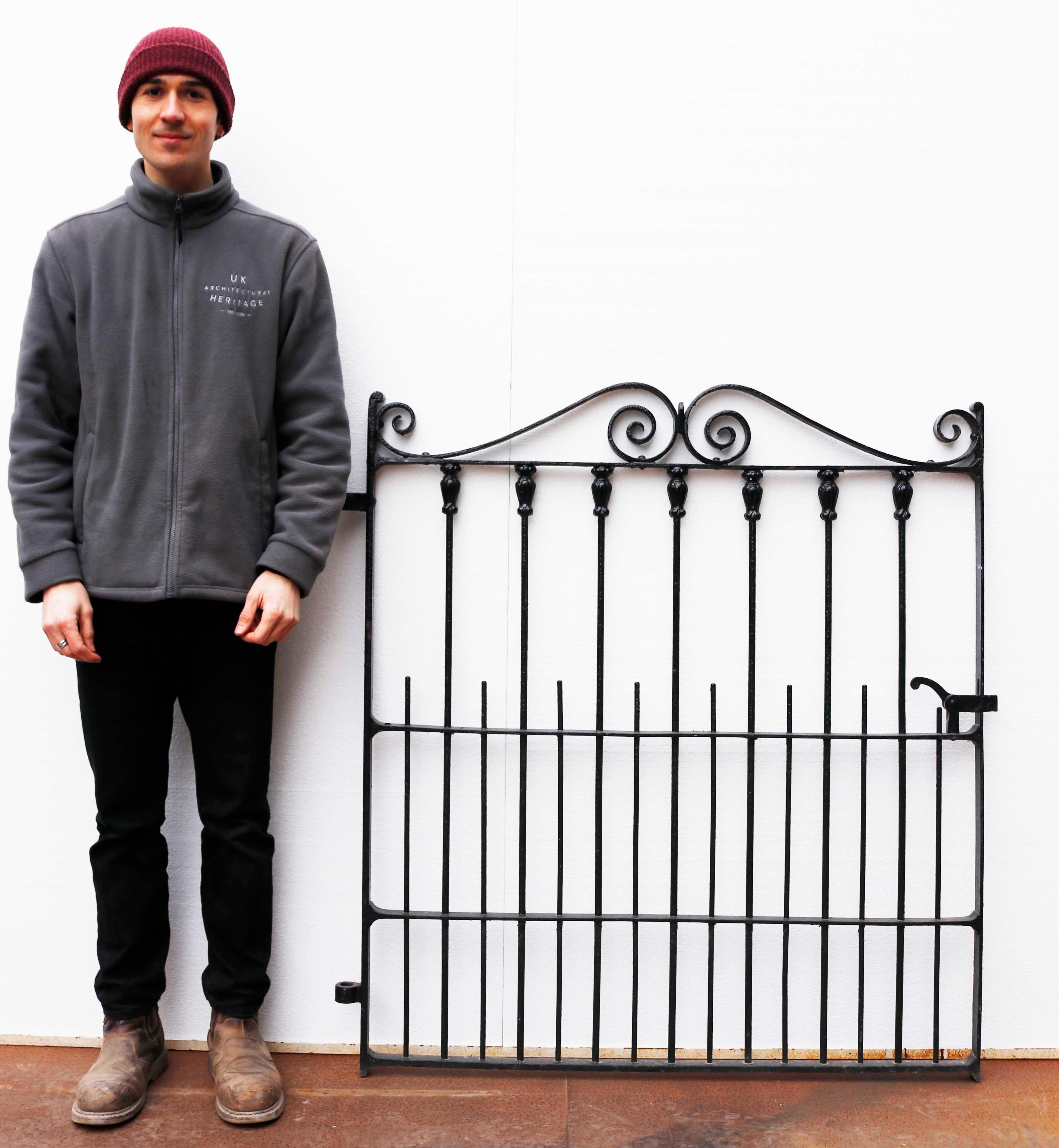 Victorian Wrought Iron Pedestrian Gate. A recently painted garden gate with a decorative scroll design.

What is wrought iron?
Wrought iron is a type of refined, low carbon iron that is smelted and worked on with tools. The term wrought iron