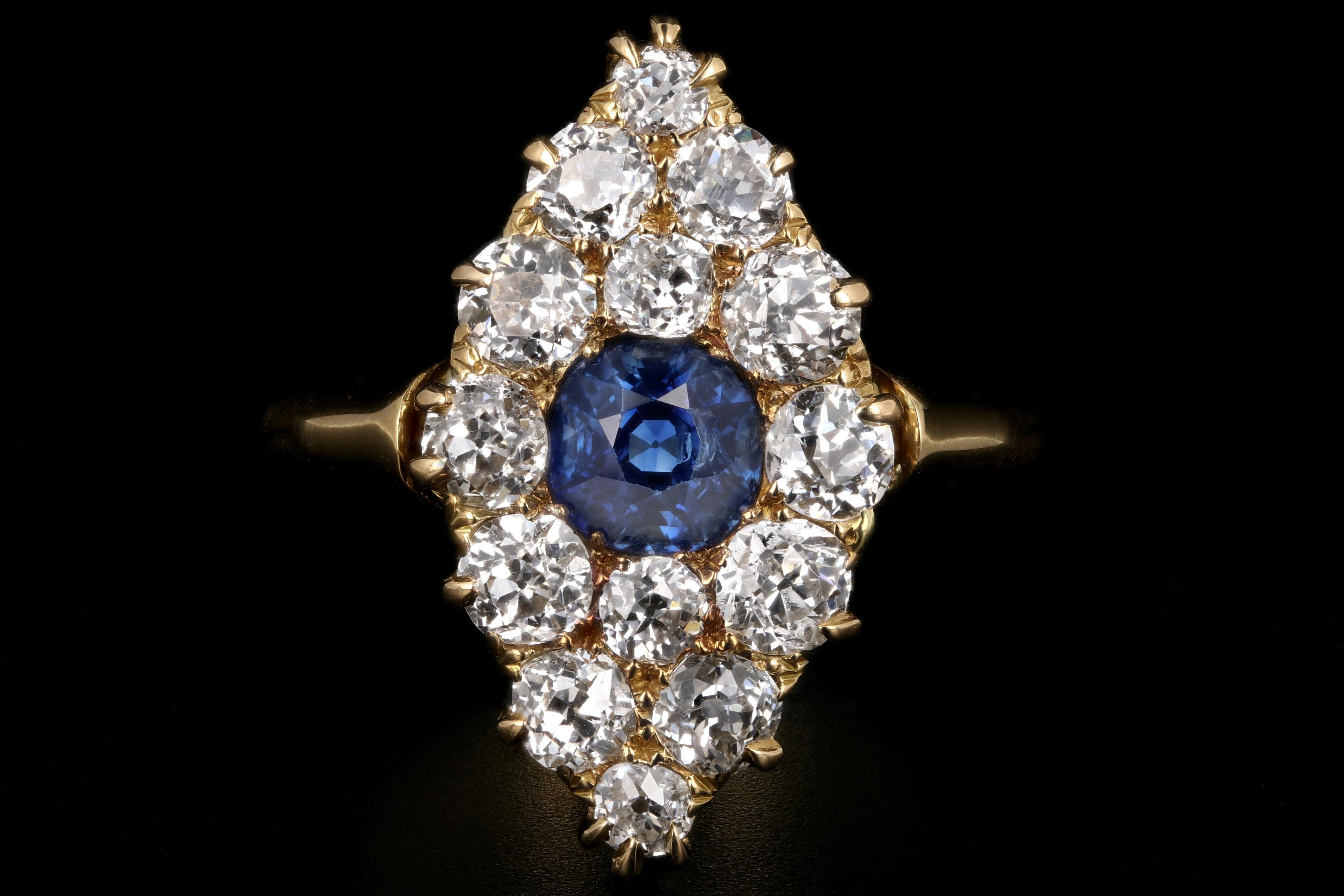 Era: Victorian

Hallmarks: None

Composition: 18K Yellow Gold

Primary Stone: Natural No Heat Old European Cut Sapphire

Stone Carat Weight: Approximately 1 Carat

Accent Stone: 14 Old European Cut Diamonds

Accent Stone Carat Weight: Approximately