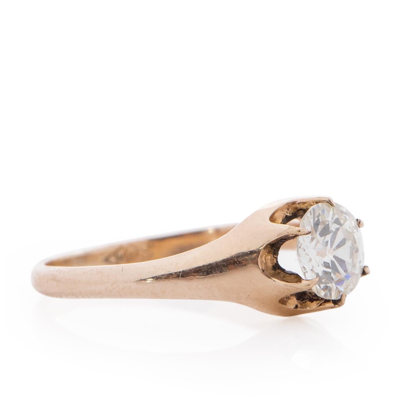 Here we have a beautiful Victorian ring that was inspired by the classic belcher style. The beautiful .90ct SI1 diamond is held in by 6 prongs, the K yellow gold mount has a smooth finish adding to its elegance but not taking away from the breath