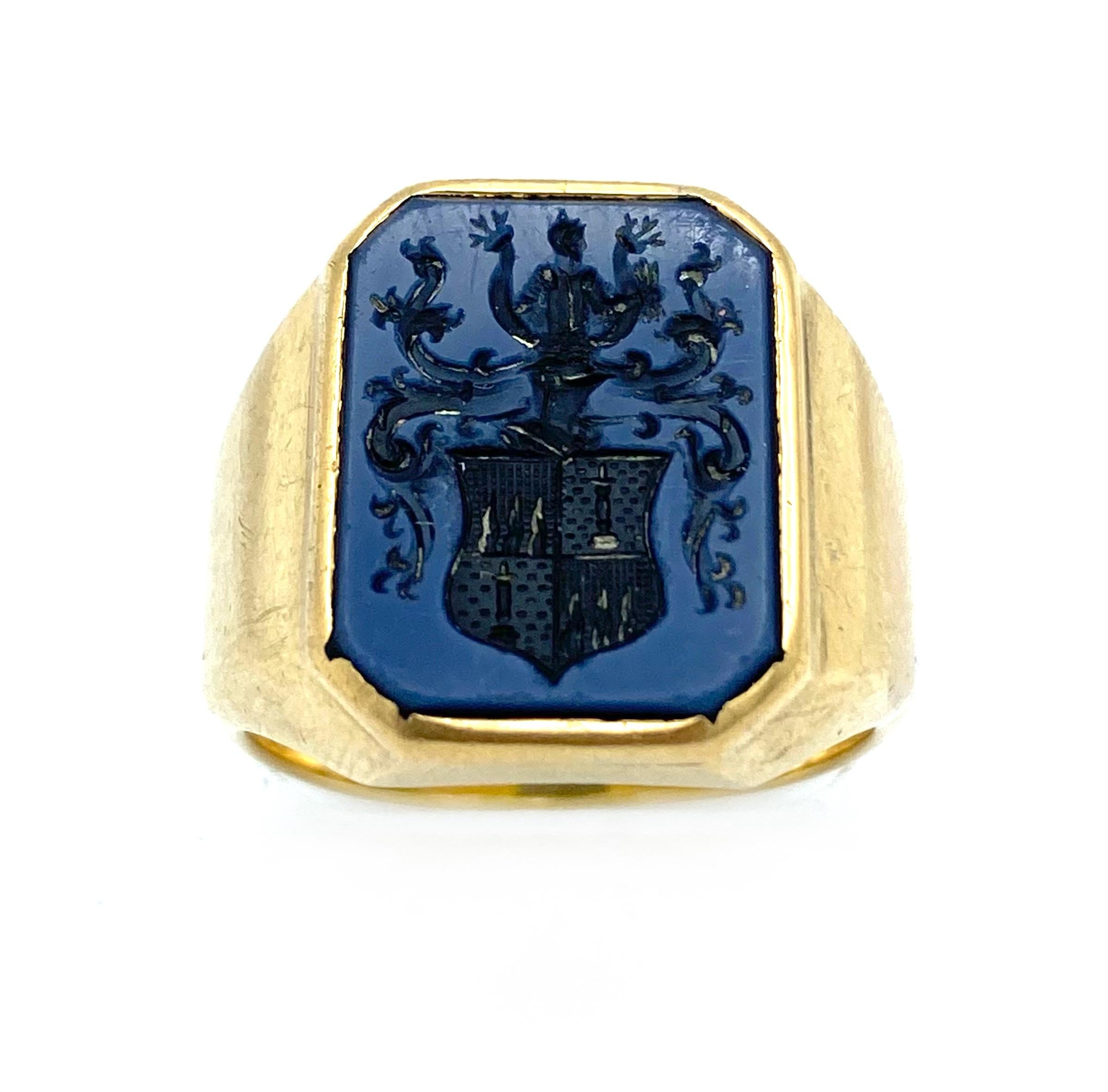 Product details:

The ring is made of the 14 karat yellow gold and carved stone, featuring family crest and signet style.

Measurements: 5/