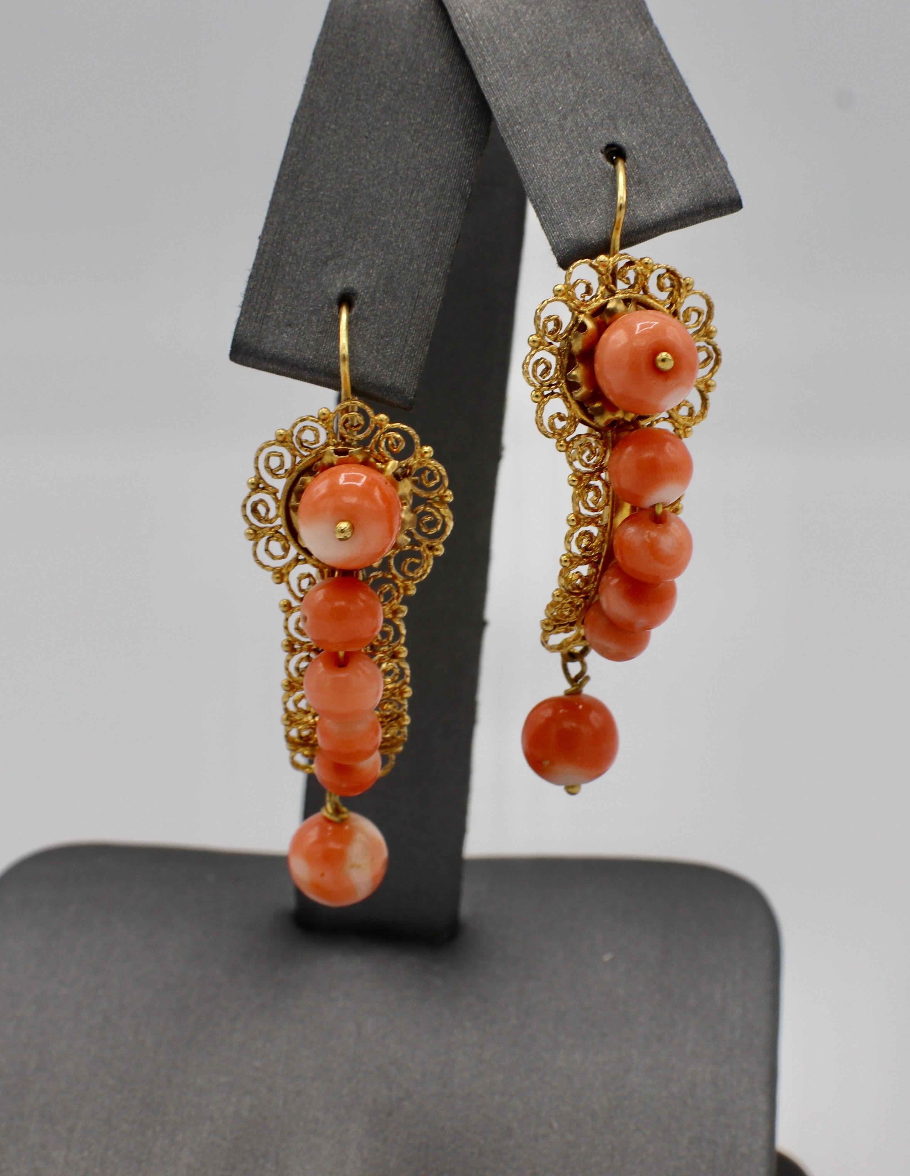 Antique Victorian 14K Yellow Gold Coral Bead Dangle Drop Earrings 
Metal: 14k yellow gold
Weight: 6.89 grams
Coral: 4.5 - 7MM
Length: 38MM
Width: 14MM

