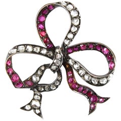 Victorian Yellow Gold Diamond and Ruby Bow Brooch 1880s