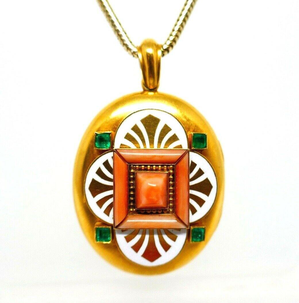 Beautiful Victorian locket pendant made of 18k yellow gold featuring emerald, coral and enamel painting. Comes with 14k yellow gold snake link chain. 
Measurements: the locket is 2