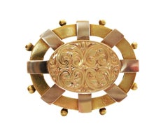 Victorian Yellow Gold Etruscan Revival Tooled Brooch with Locket, Circa 1860's