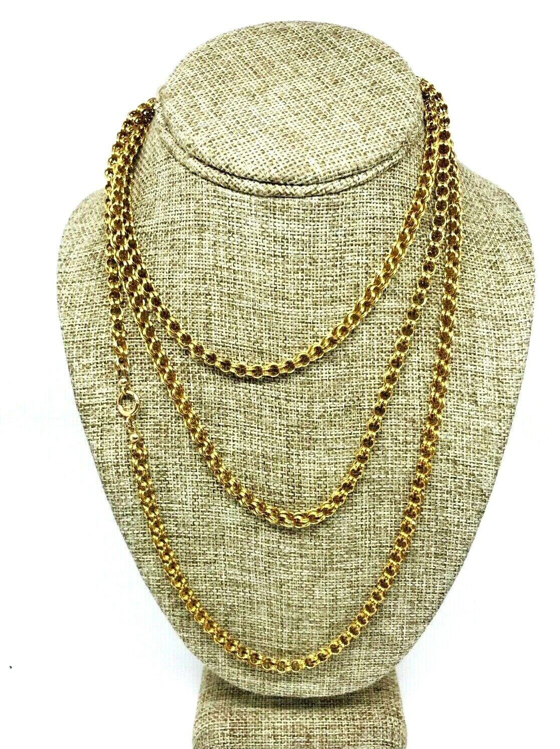 Victorian chain necklace made of 14k yellow gold. The extra long length allows to wrap it double or triple around the neck. Perfect for layering yet as a single necklace. 
Measurements: 55