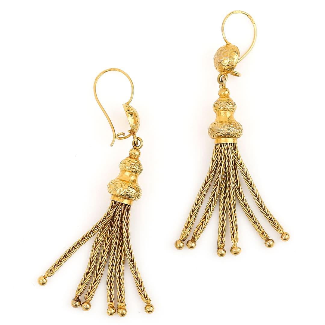 A fantastic antique pair of 9ct yellow gold Victorian tassel drop earrings made in the Etruscan style popular in the period. Fitted with foxtail link tassels this style of antique earring was popular during the mid to late 19th century. They are