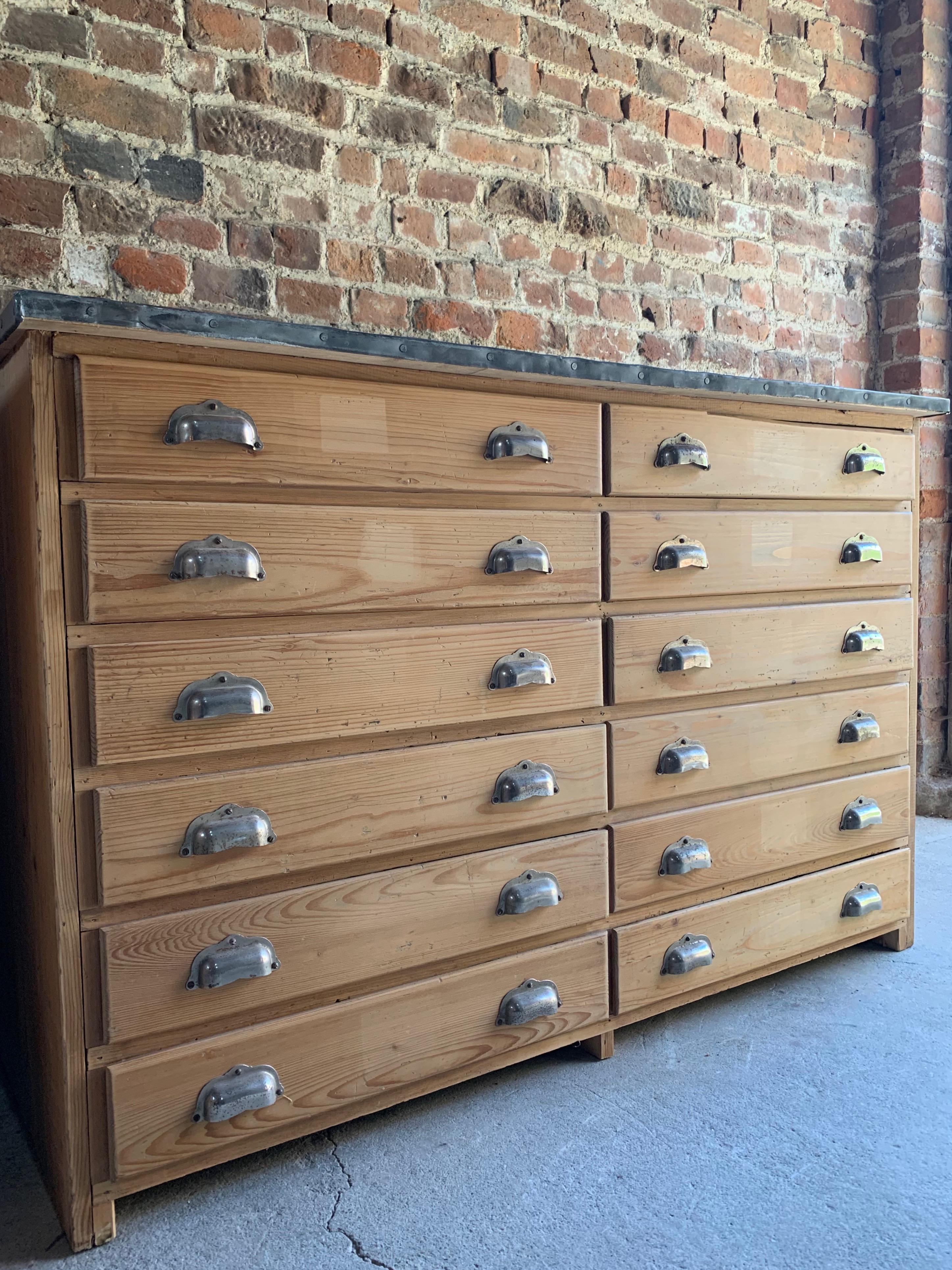 Victorian Zinc Top Engineers Industrial Pine Chest of Drawers / Sideboard Circa 1890

Magnificent Victorian Zinc topped Pine engineers industrial chest of drawers circa 1890, the rectangular zinc riveted top over twelve drawers each with original