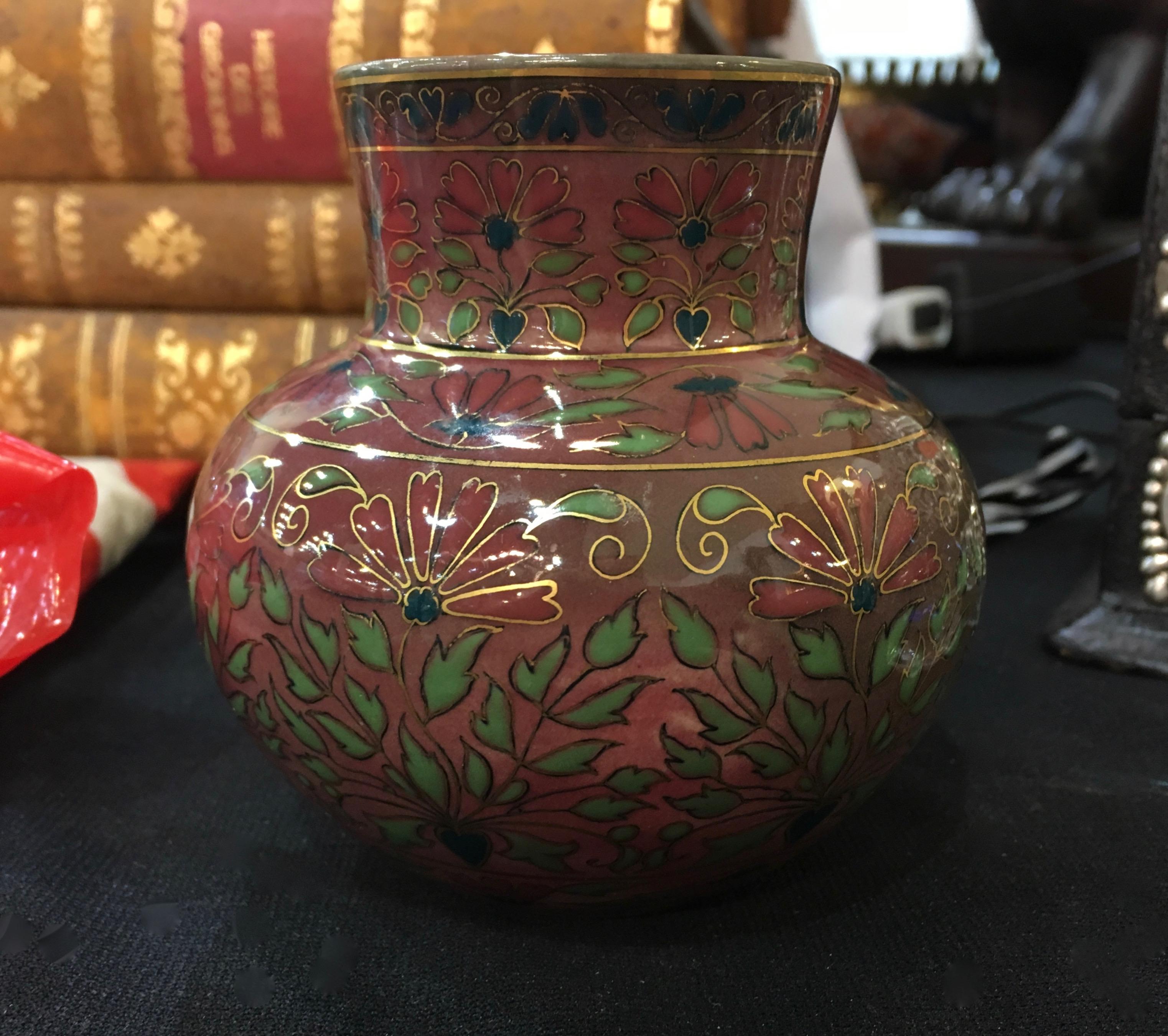 A diminutive 19th century cabinet vase in porcelain faience with hand-painted cloisonne-Style decor from Zsolnay Pecs of Hungary. The highly ornamental vessel is an early Zsolnay piece and a fine example of Victorian eclecticism, hand-decorated with