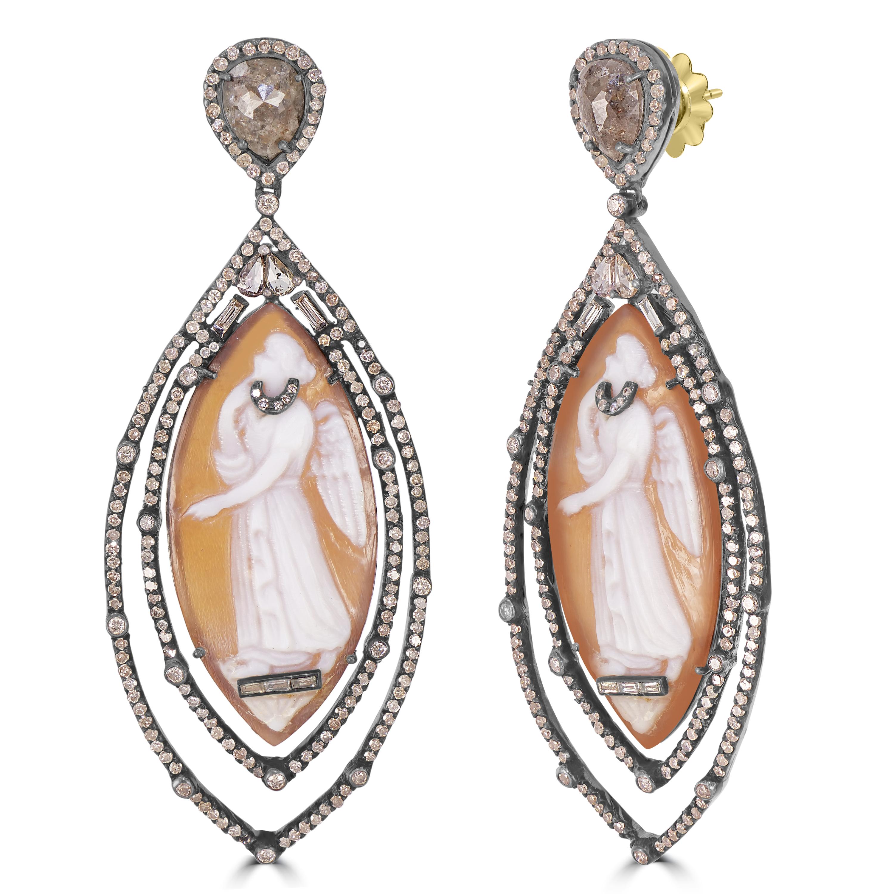 Presenting the Victorian 28.57 Cttw. Brown Cameos and Diamond Marquise Drop Dangle Earrings—a true masterpiece that seamlessly blends vintage charm with contemporary elegance.

The unique marquise double-drop frames are meticulously adorned with a