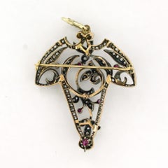 Victorianbrooch/ pendant with ruby and rose cut diamonds 18k gold, silver