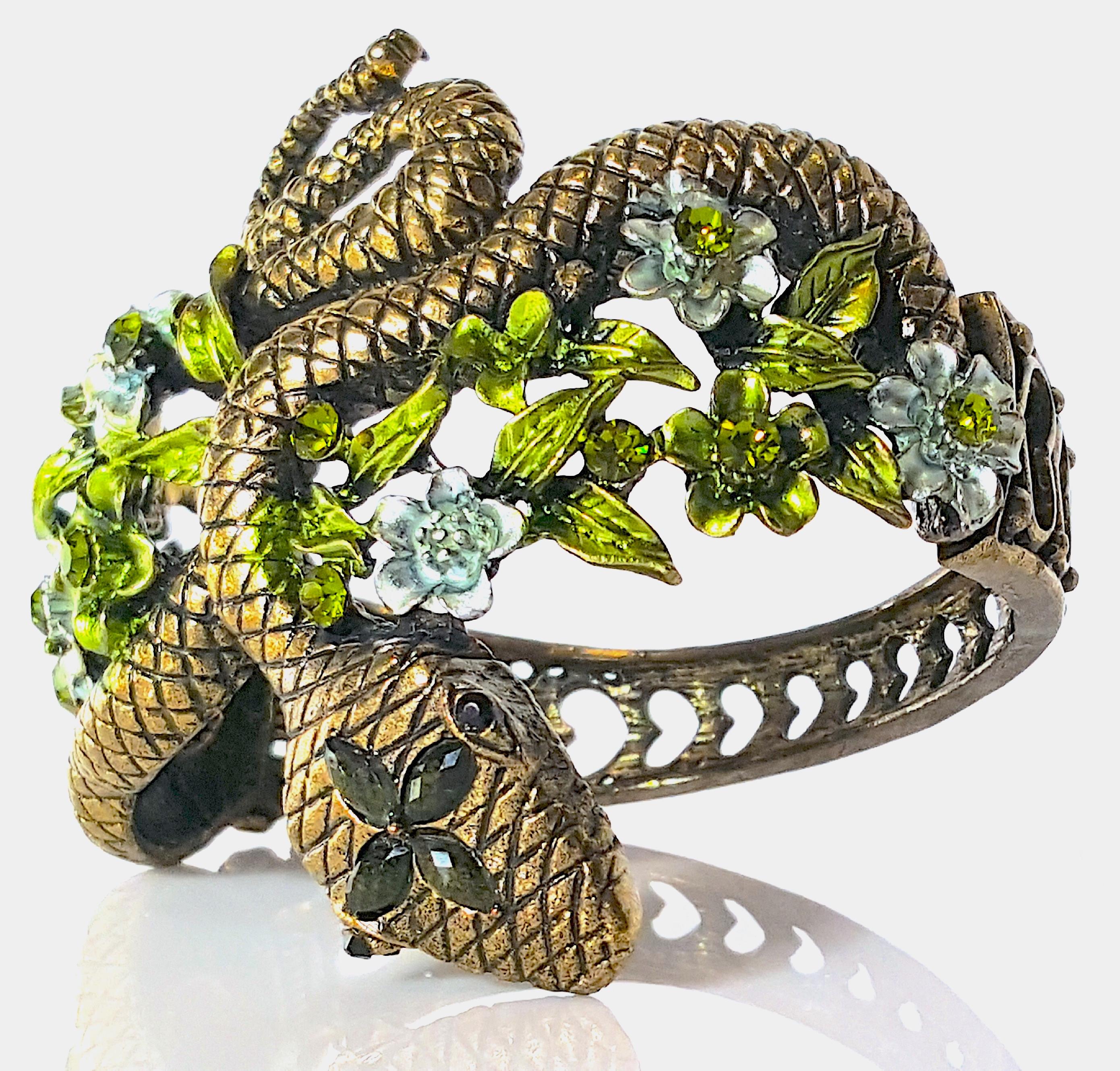 With all the mid-century hallmarks of handcrafted costume jewelry by New-York-City-based Hargo Creations but without the post-copyright signature (HAR), for this early bracelet the design duo created a cast aged-gold textured serpent snake that