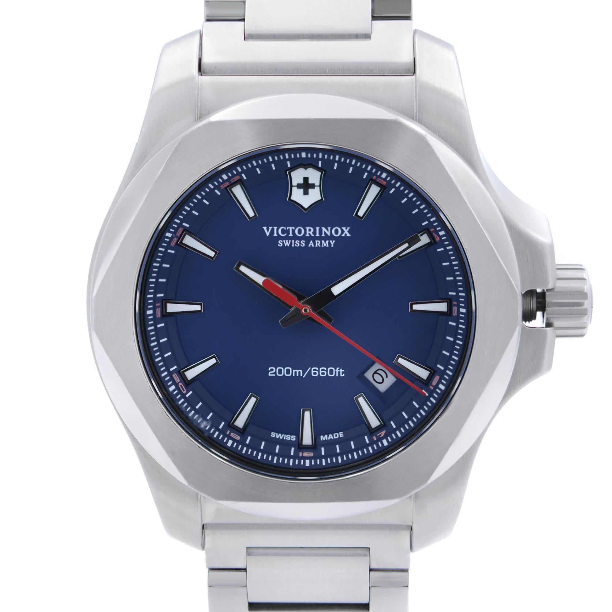 Display model Victorinox Swiss Army I.N.O.X. Stainless Steel 42 mm Blue Dial Men's Quartz Watch 241724.1. This Beautiful Timepiece Features: Brushed Stainless Steel Case and Bracelet. Fixed Stainless Steel Bezel. Blue Dial with Luminous Silver-tone