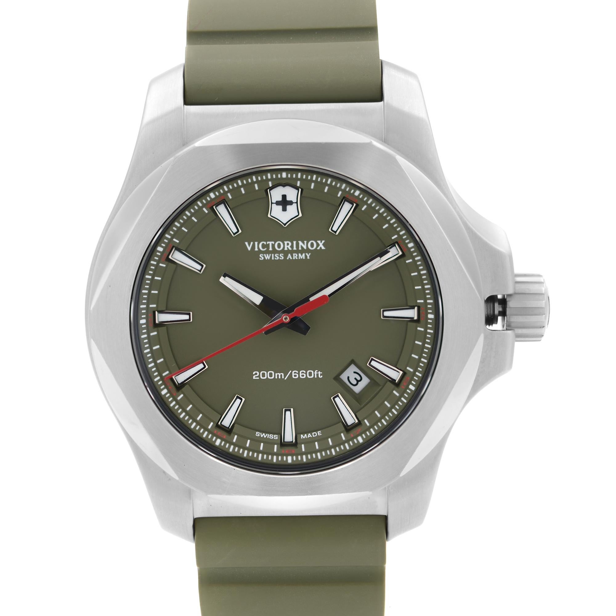 Pre-owned like new Victorinox Swiss Army I.N.O.X. Stainless Steel 43mm Green Dial Men's Quartz Watch 241683.1. This Beautiful Timepiece Features: Brushed Stainless Steel Case and Two-Piece Rubber Strap. Fixed Stainless Steel Bezel. Green Dial with