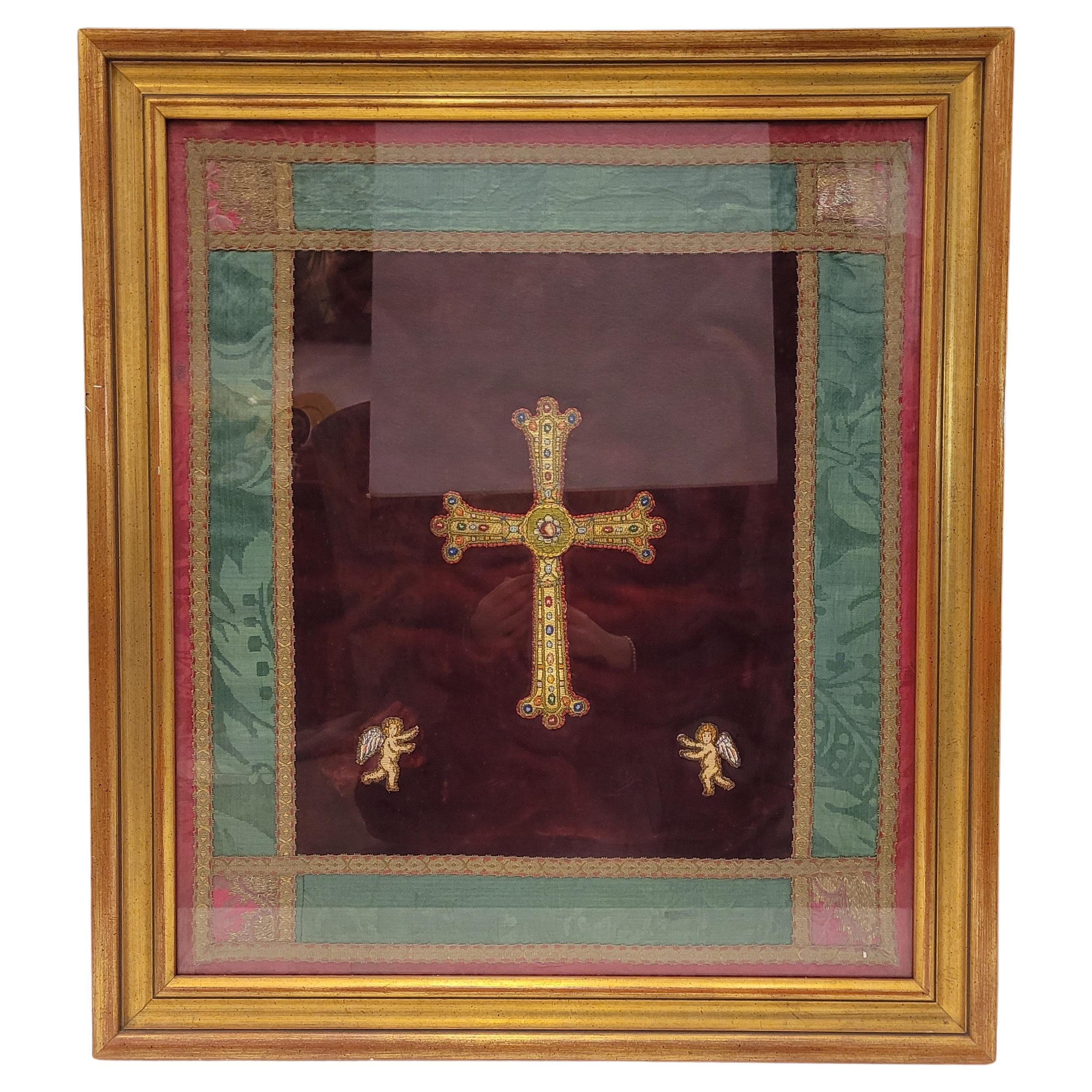 Victory cross embroidered on a parish priest's  Spanish chasuble, two angels