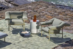 Sillón verde de exterior Vidalenta de Patricia Urquiola para Cassina