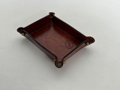 Vide-Poche in Cognac Leather and Brass. Italian Work, “i Santi”. Circa 1970