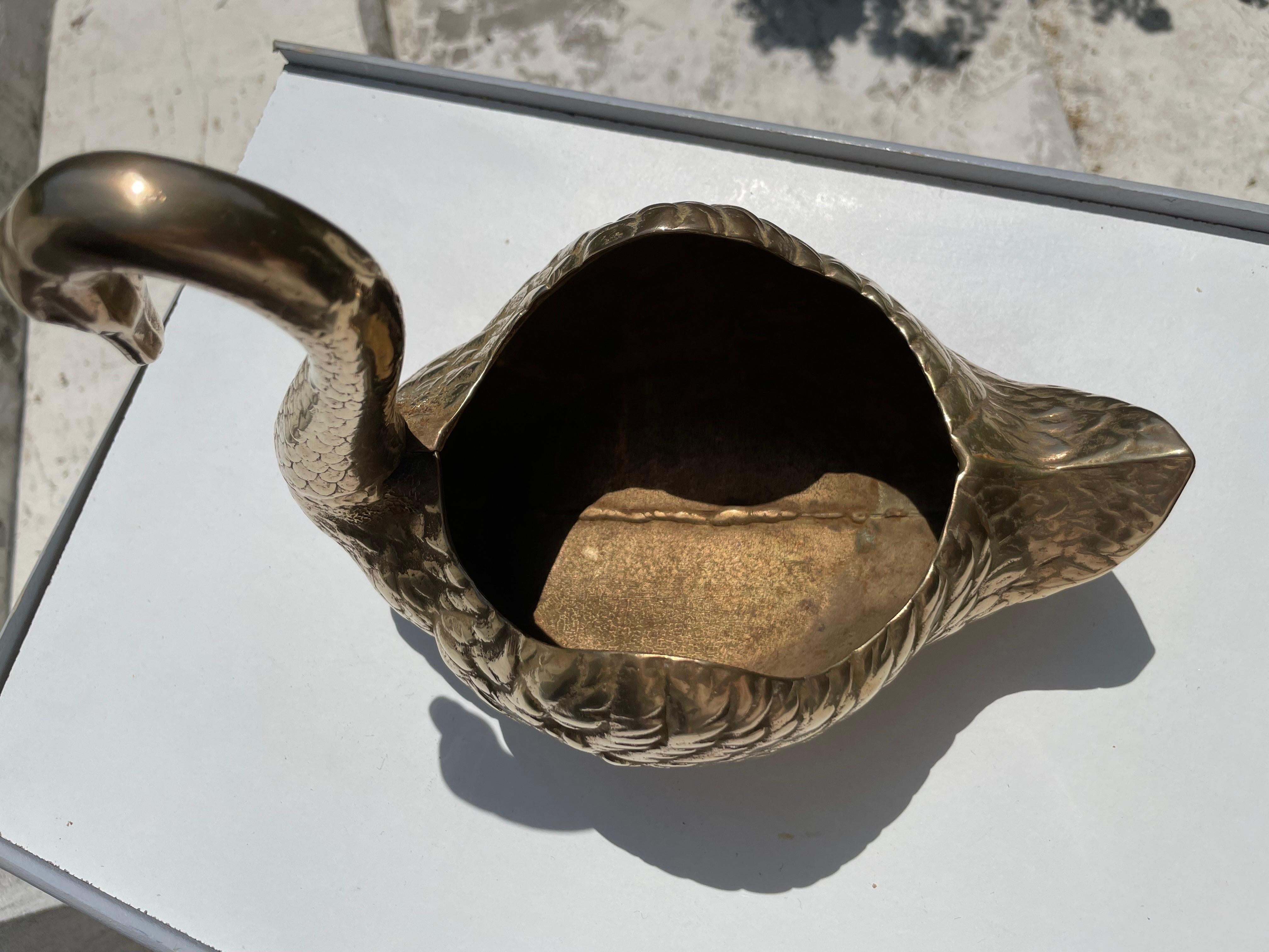 large brass swans
