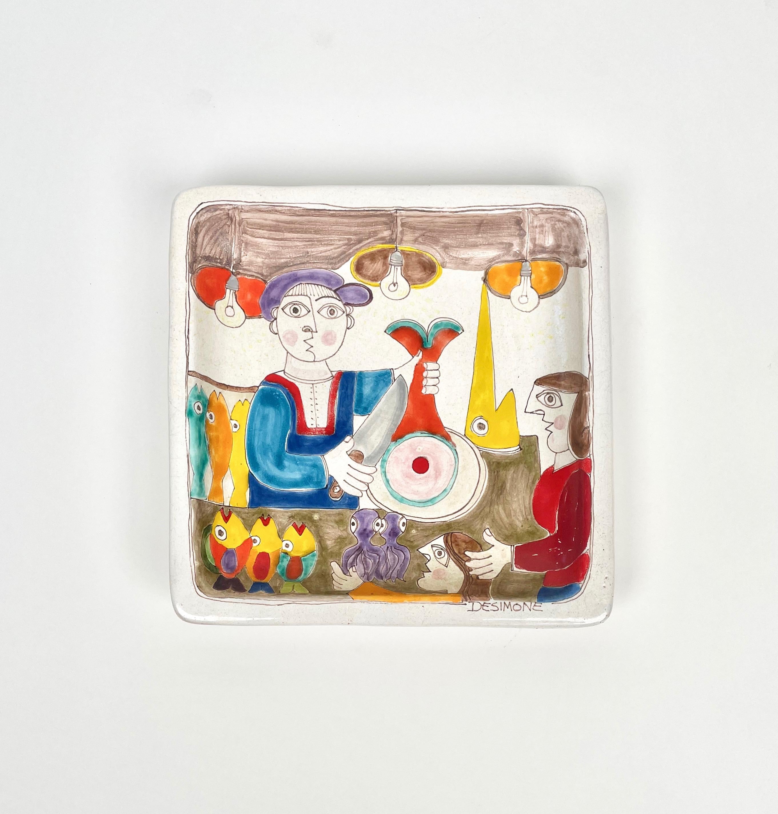 Beautiful squared   wall mounted tile platen or vide-poche in colored ceramic by the Italian artisti Giovanni De Simone.

Giovanni De Simone was a great Sicilian artist from Palermo whose style was inspired by Pablo Picasso paintings.   

Made in