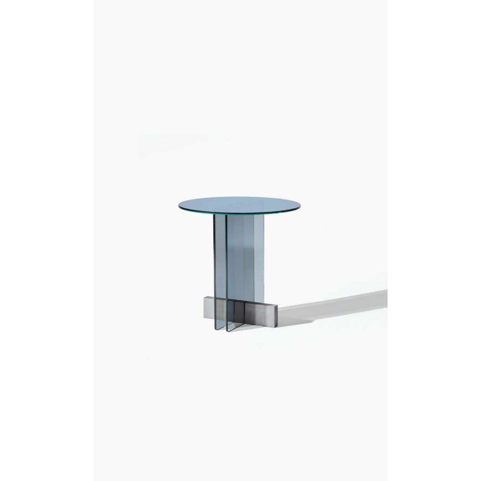 Vidro Side Table L by Wentz
Dimensions: D 60 x W 60 x H 50 cm
Materials: Glass, Wood.
Weight: 17,2kg / 38 lbs

The constant search for lightness in different forms led to a new project that has glass as the protagonist. The wooden base works as a